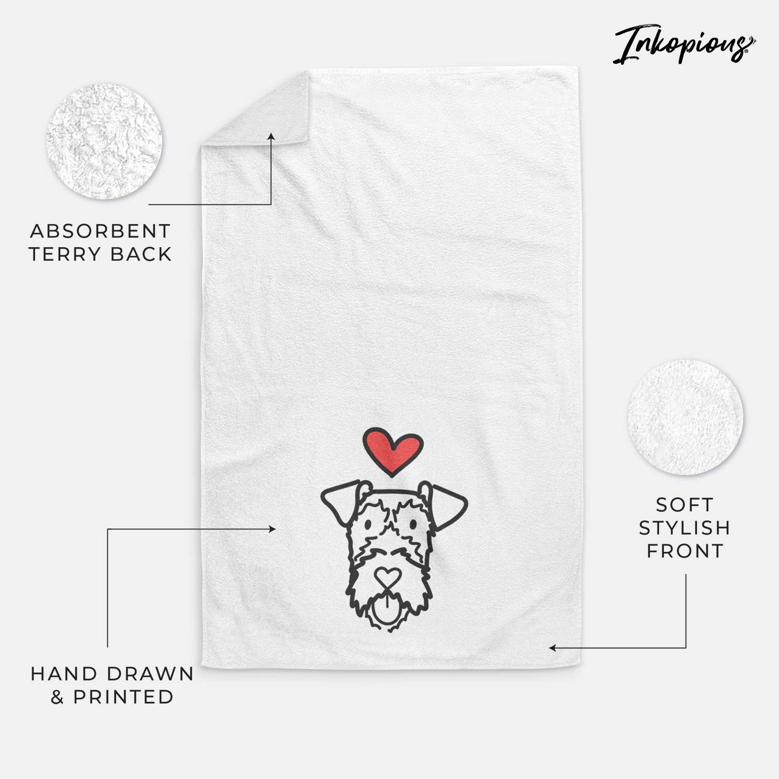 Minimalist line drawing of an Irish Terrier with a red heart on a decorative hand towel