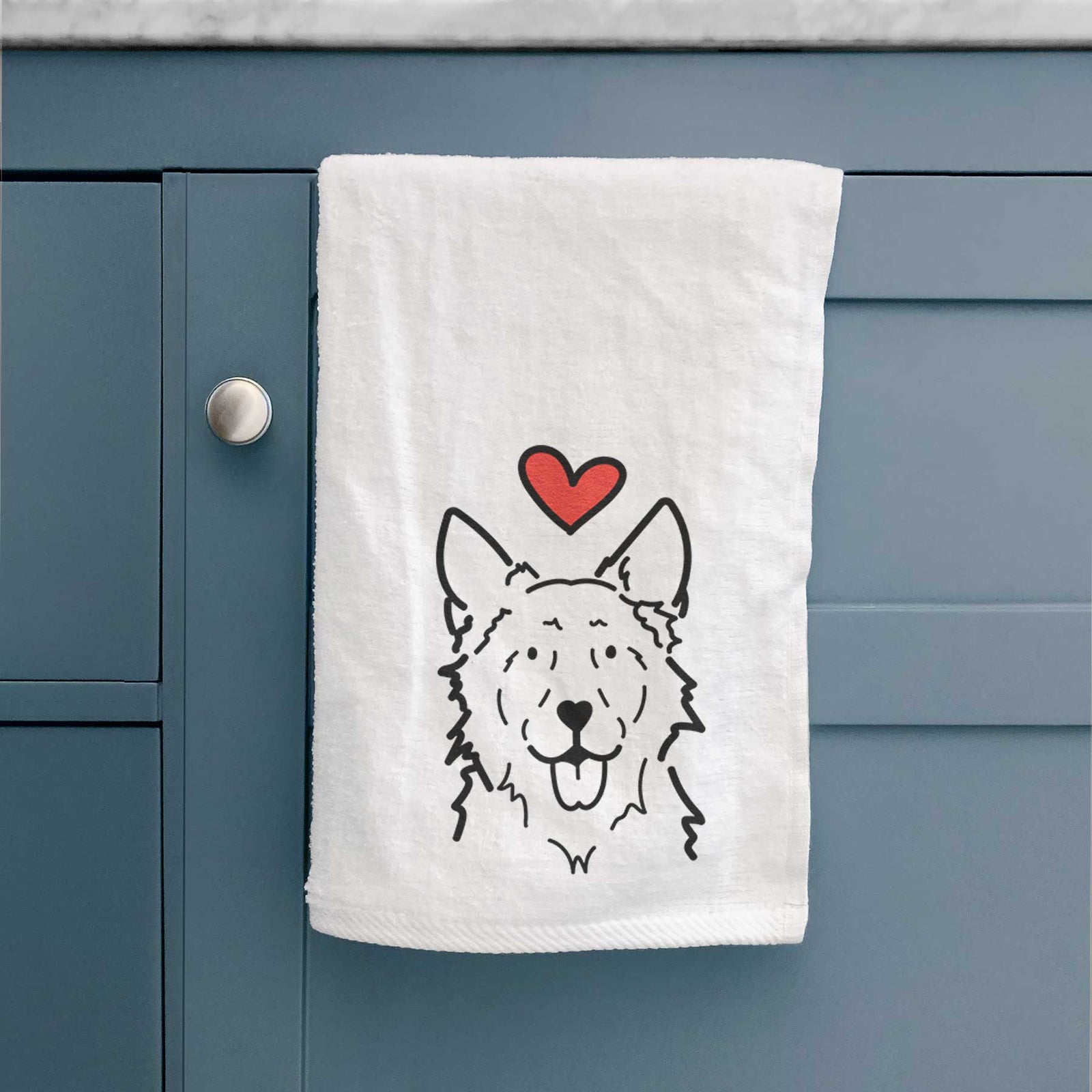 Minimalist line drawing of Jack the Mudi with a red heart on a decorative hand towel