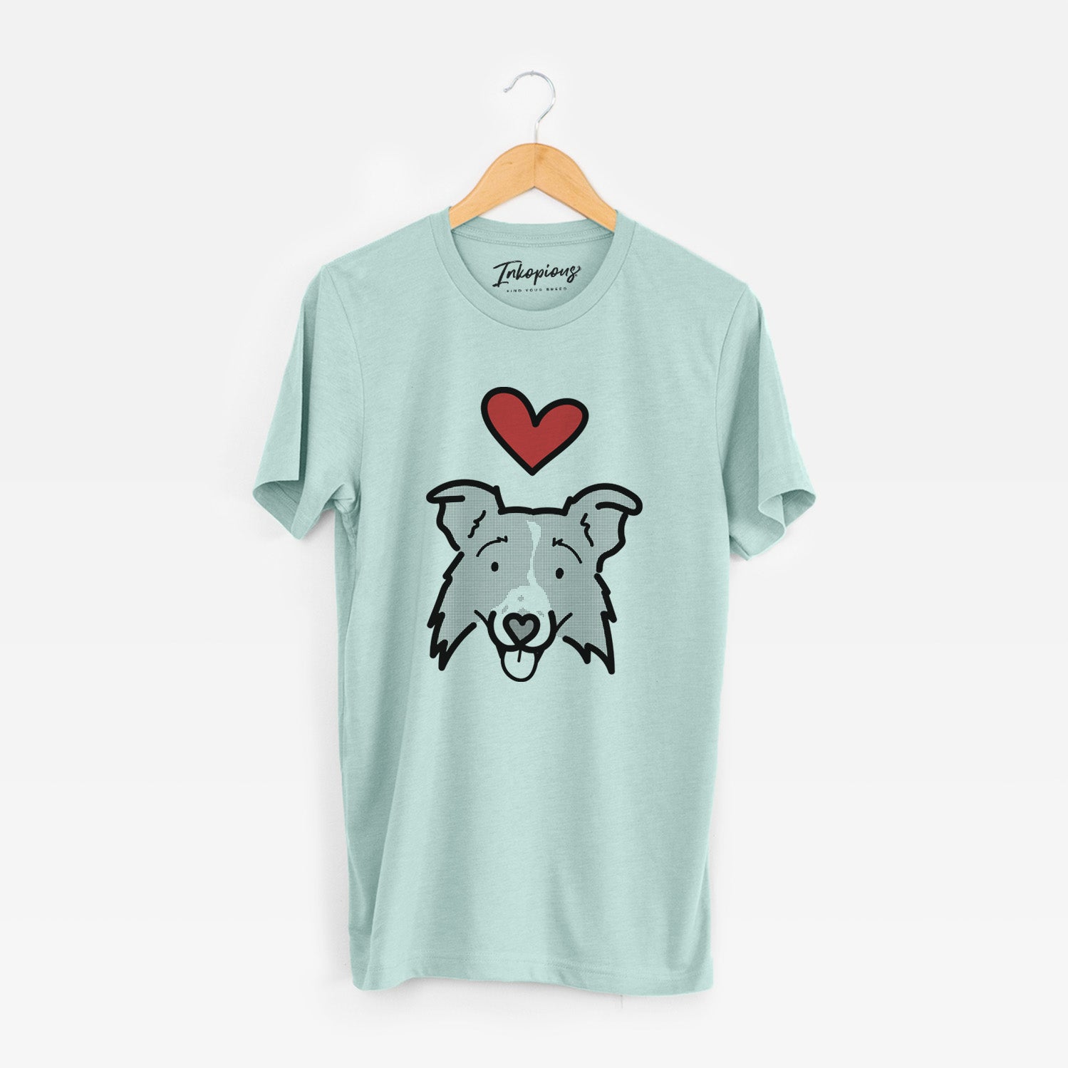 Minimalist line drawing of Jam the Border Collie 2.0 with a red heart on a Heather Sage Unisex crewneck