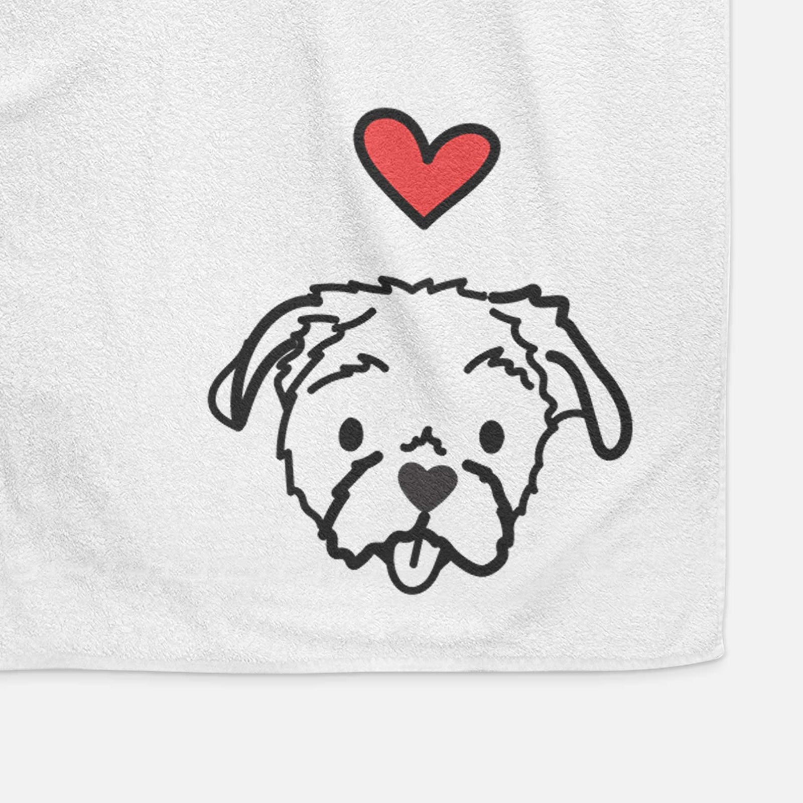 Minimalist line drawing of Koko the Shih Tzu with a red heart on a decorative hand towel
