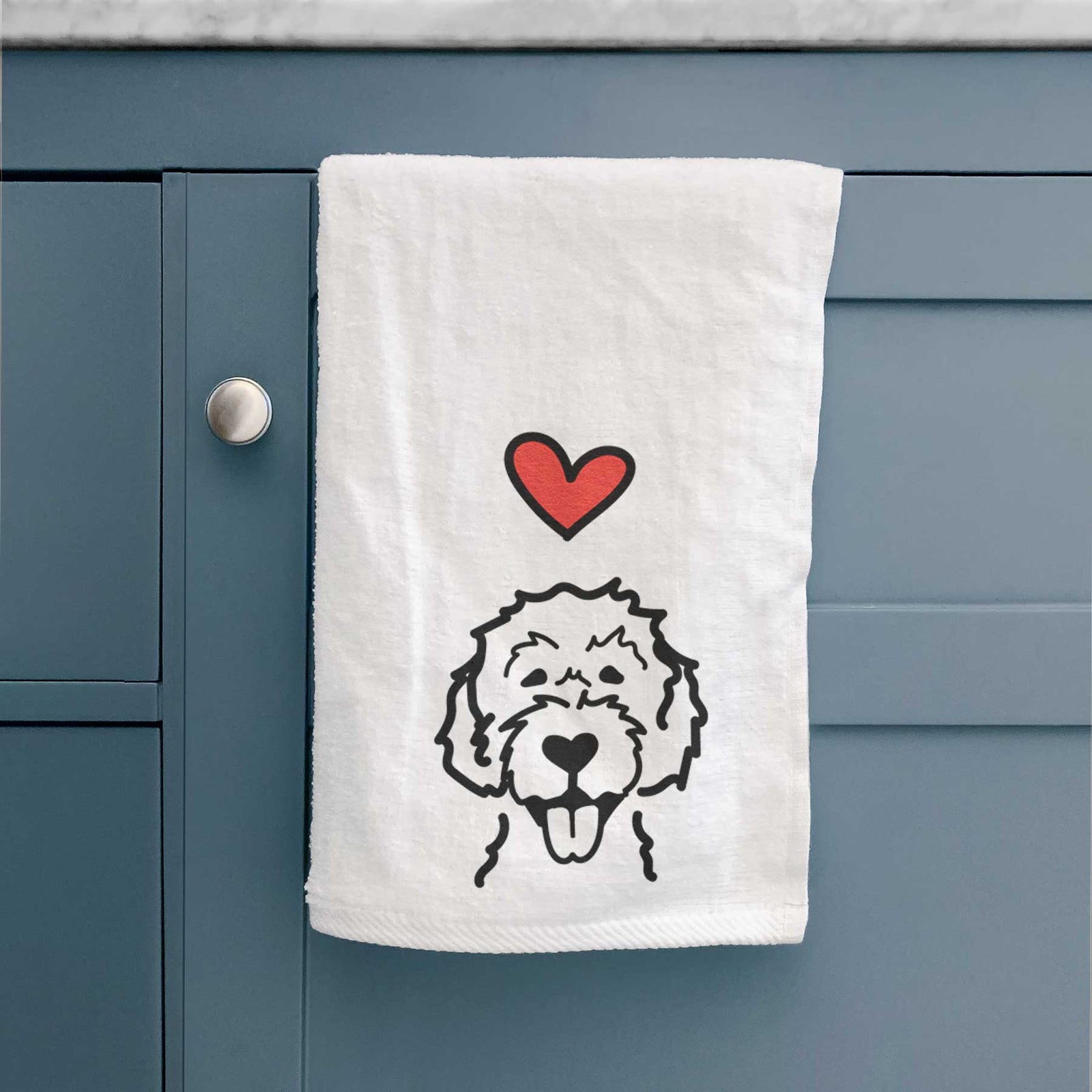 Minimalist line drawing of a Labradoodle with a red heart on a decorative hand towel