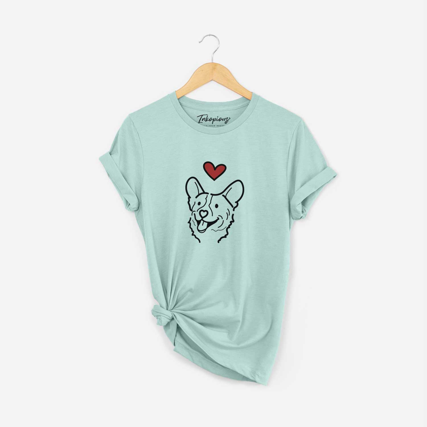 Minimalist line drawing of Lily the Corgi with a red heart on a Heather Sage Unisex crewneck