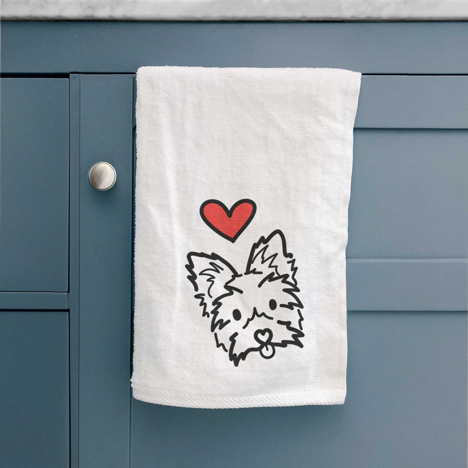 Minimalist line drawing of Luna the Yorkshire Terrier with a red heart on a decorative hand towel
