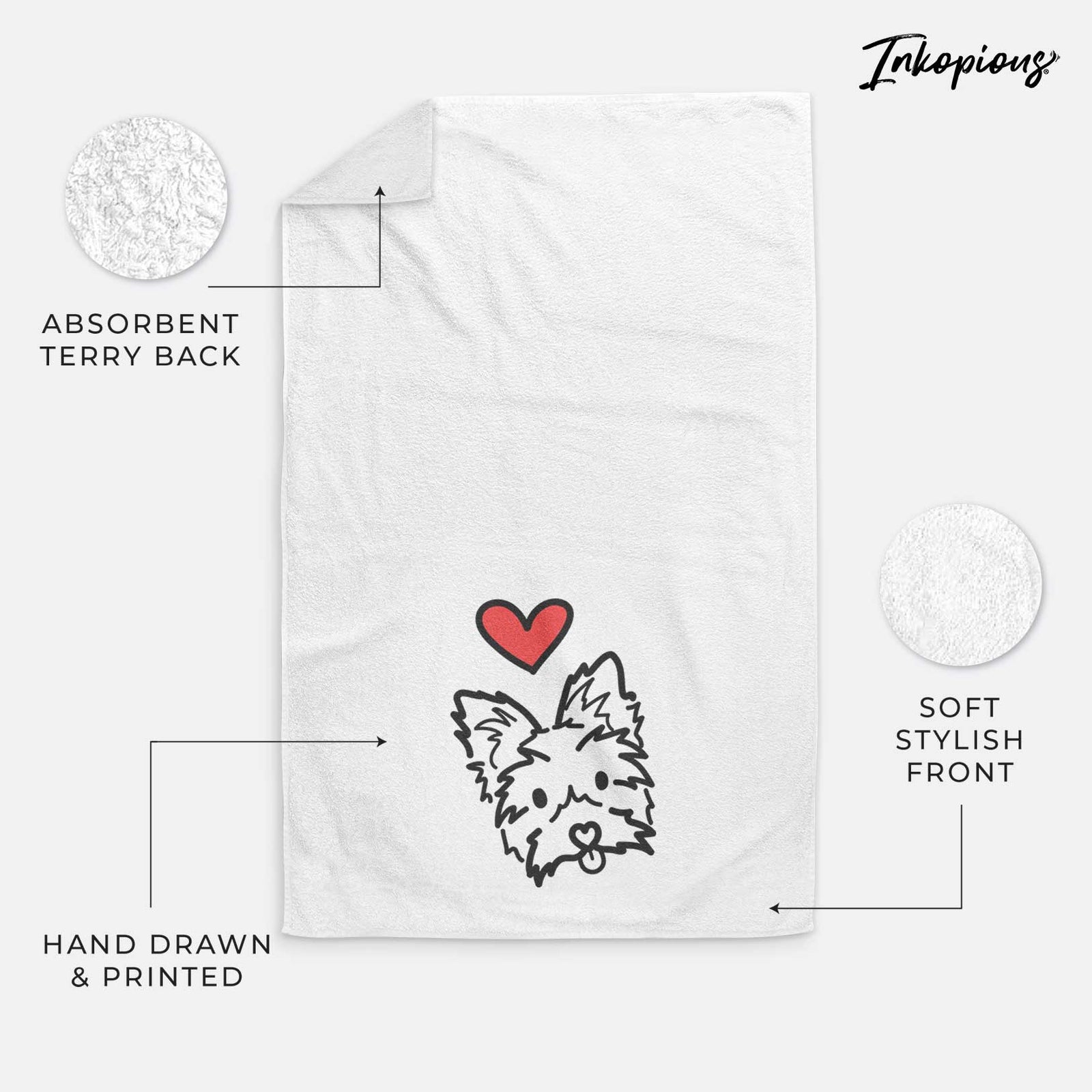 Minimalist line drawing of Luna the Yorkshire Terrier with a red heart on a decorative hand towel
