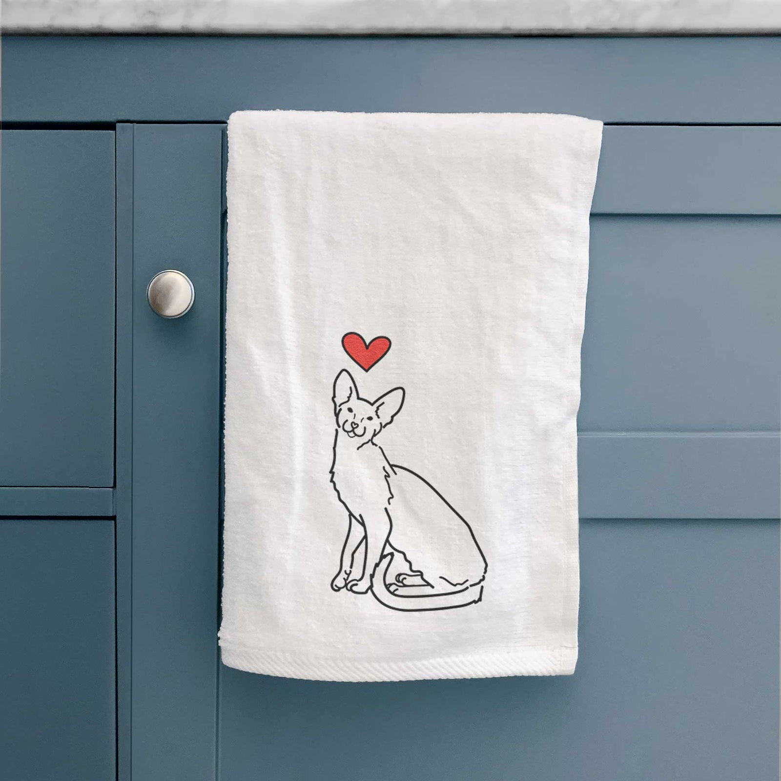 Minimalist line drawing of Lyra the Oriental Shorthair Cat with a red heart on a decorative hand towel