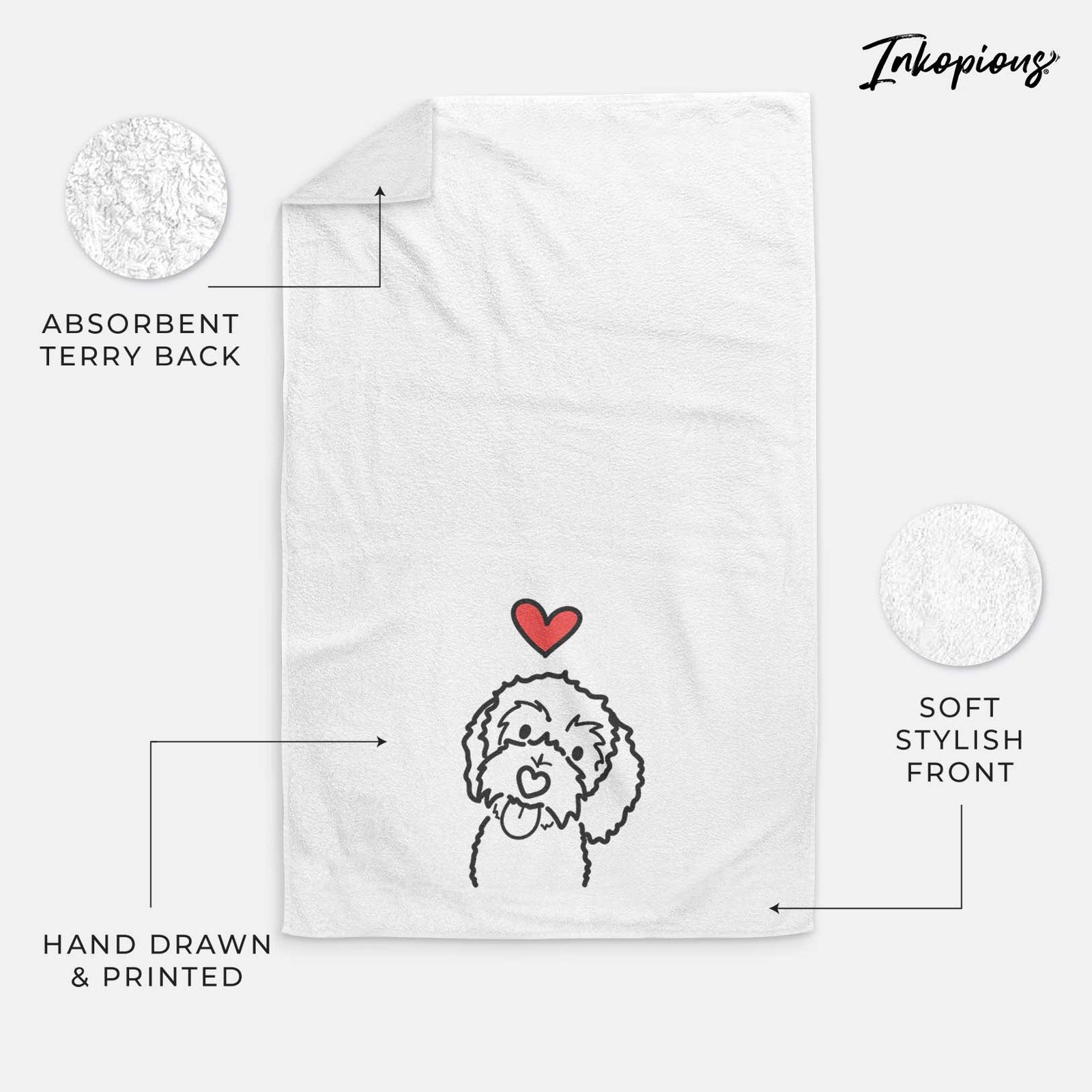 Minimalist line drawing of Mabel the Bernedoodle with a red heart on a decorative hand towel