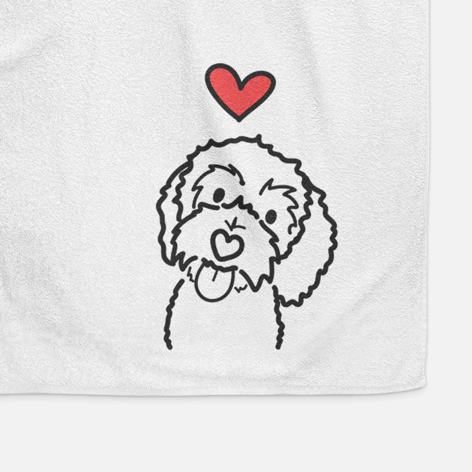Minimalist line drawing of Mabel the Bernedoodle with a red heart on a decorative hand towel