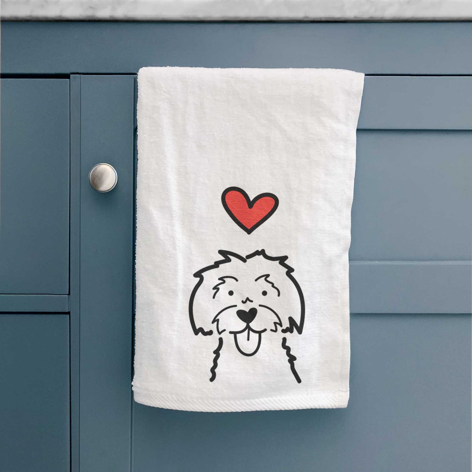 Minimalist line drawing of a Maltese with a red heart on a decorative hand towel