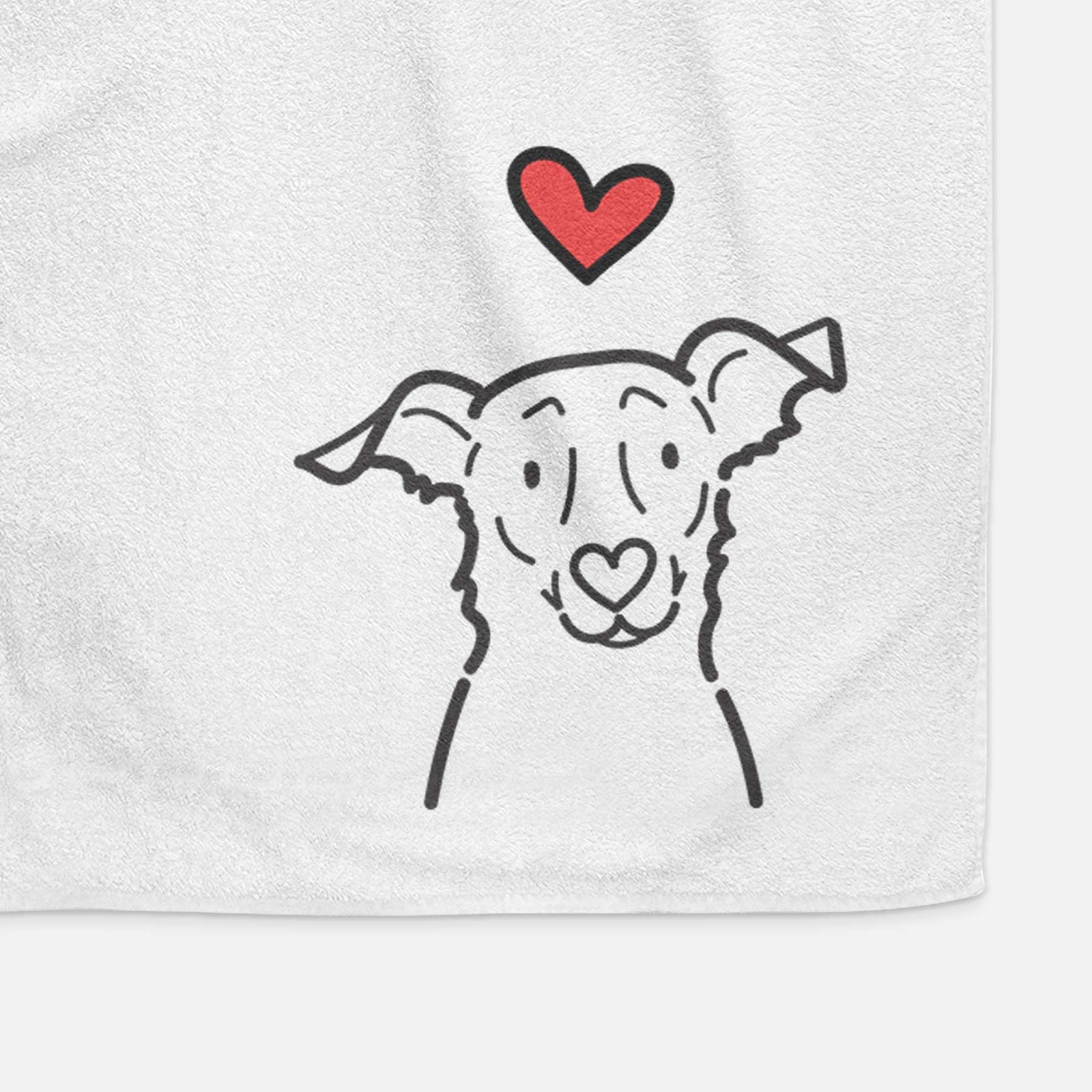 Minimalist line drawing of Millie the Border Collie Mix with a red heart on a decorative hand towel