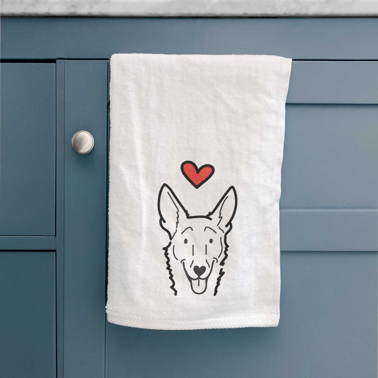 Minimalist line drawing of Mochi the Carolina Dog with a red heart on a decorative hand towel