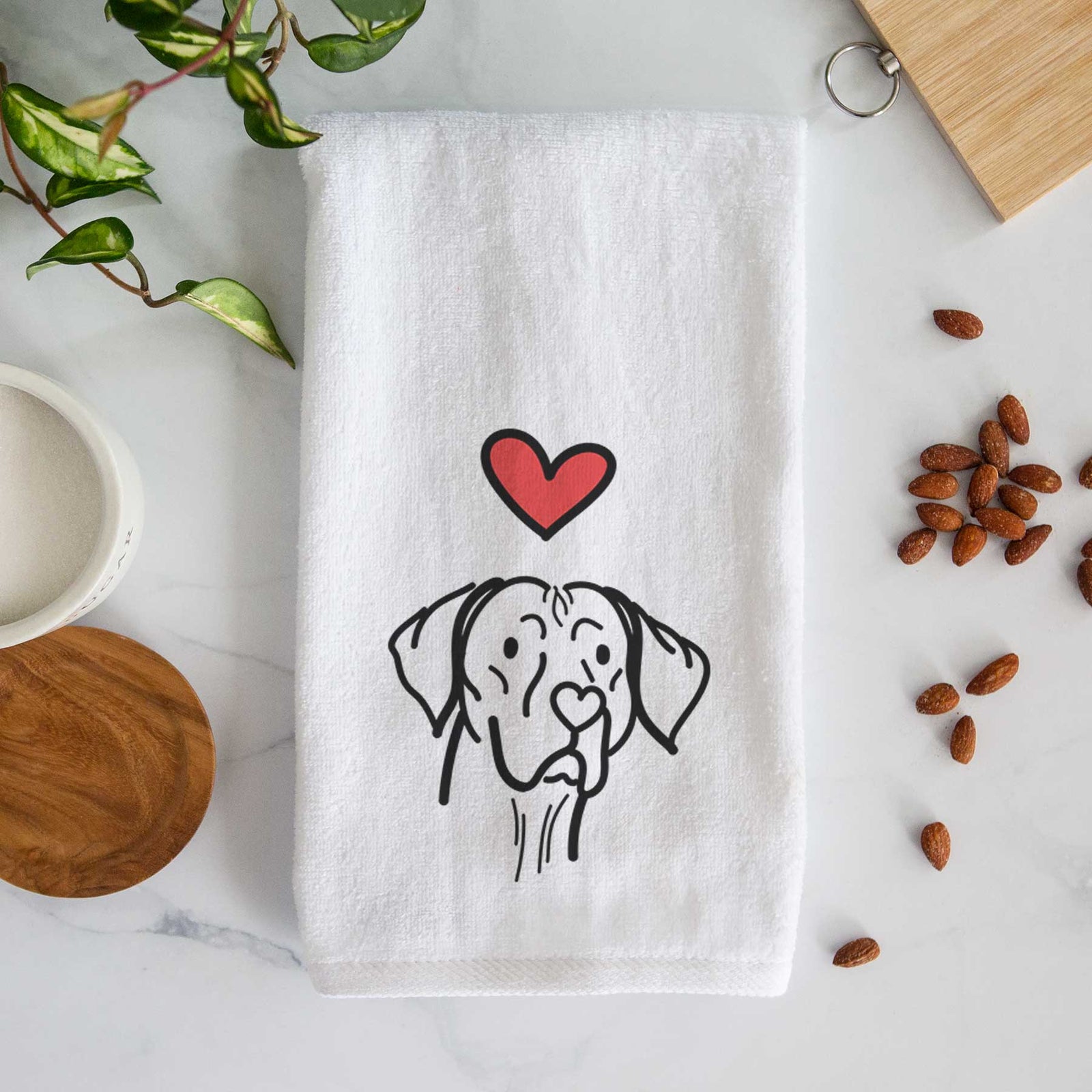 Minimalist line drawing of Moose the Vizsla with a red heart on a decorative hand towel