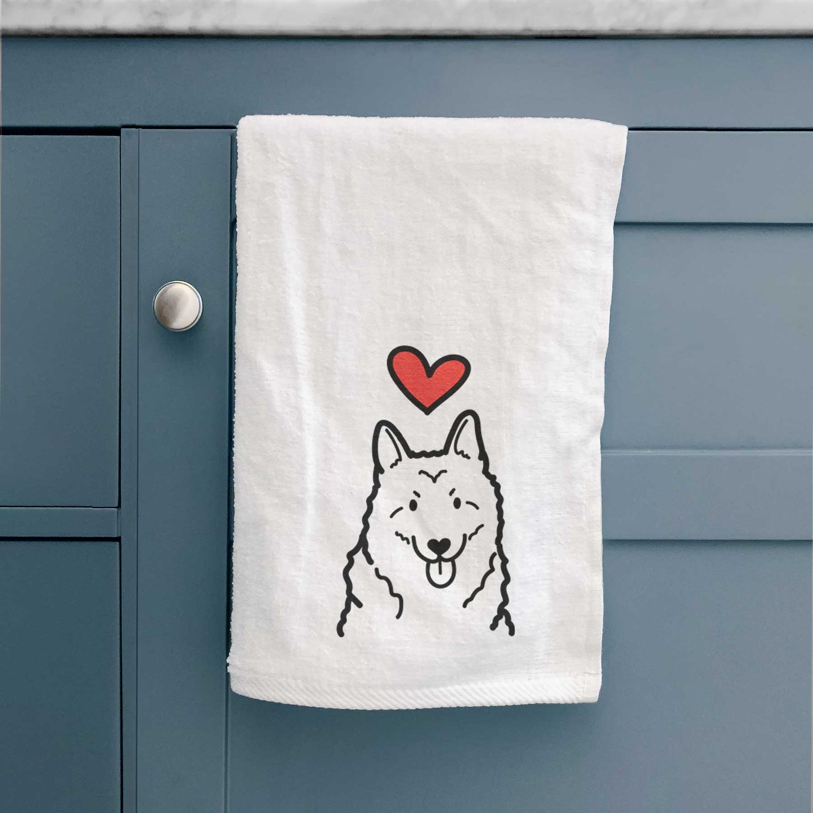 Minimalist line drawing of a Norwegian Elkhound with a red heart on a decorative hand towel