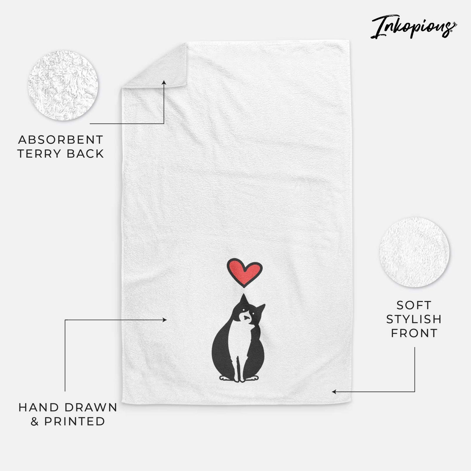 Minimalist line drawing of Oliver the Tuxedo Cat with a red heart on a decorative hand towel