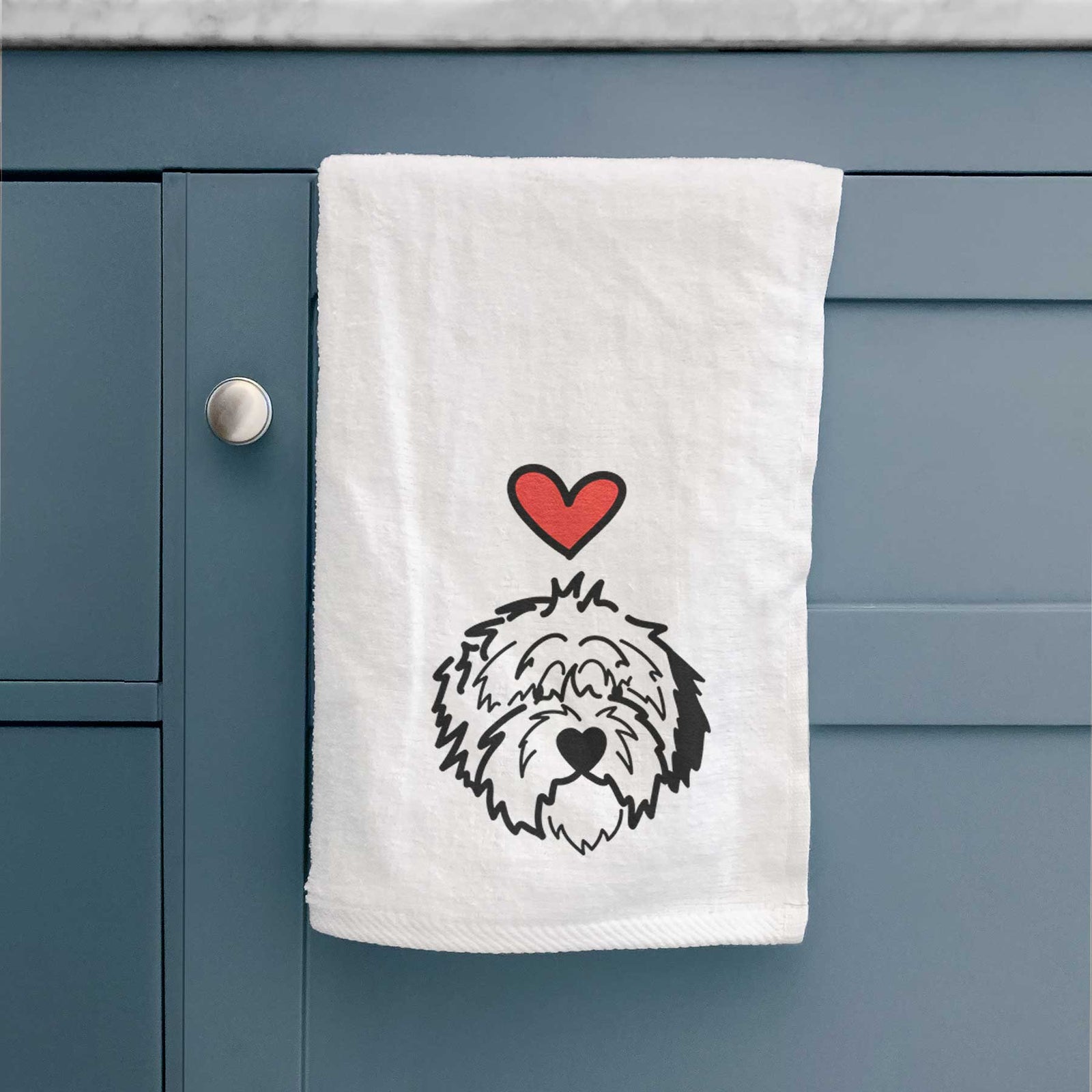 Minimalist line drawing of Penny the Old English Sheepdog with a red heart on a decorative hand towel