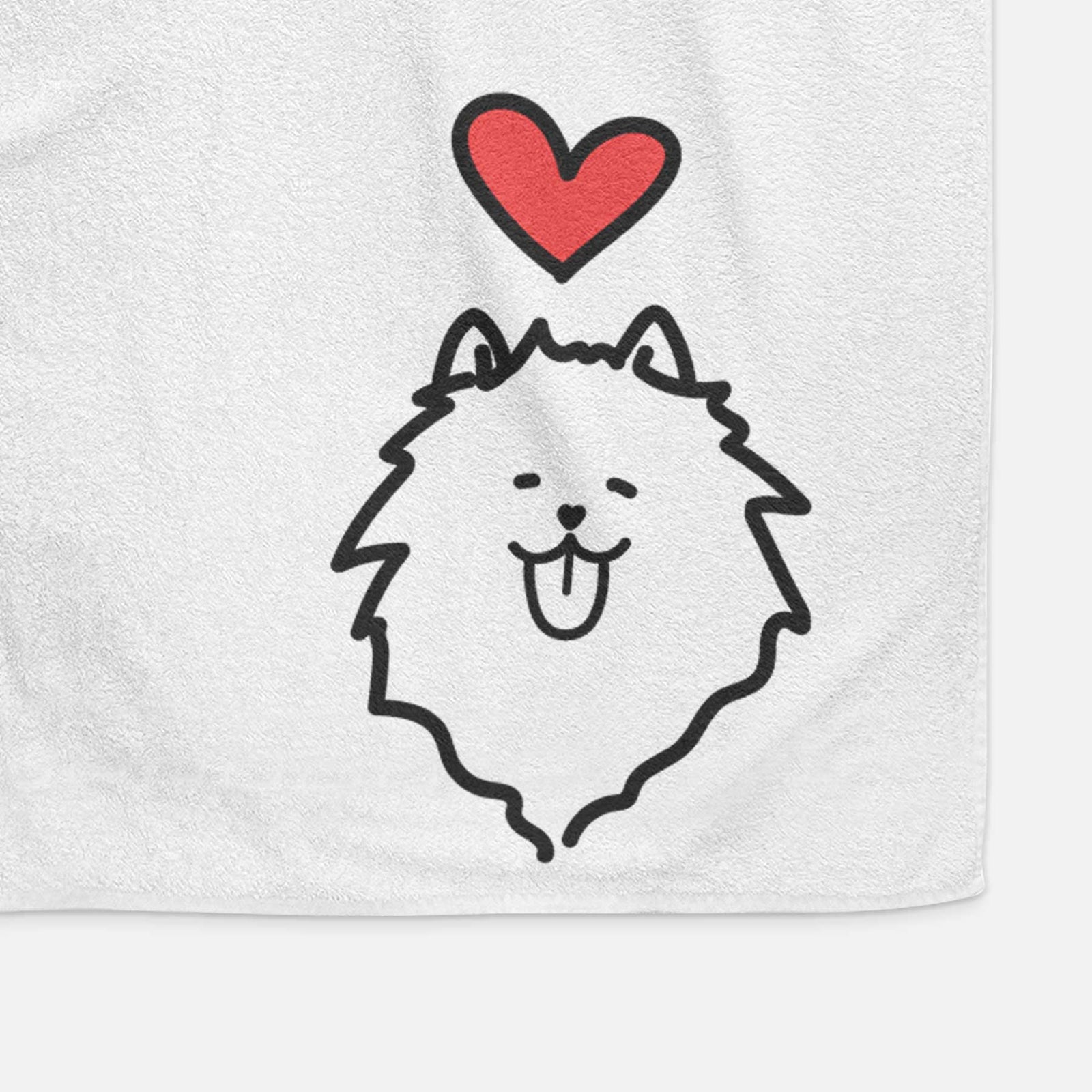 Minimalist line drawing of a Pomeranian with a red heart on a decorative hand towel