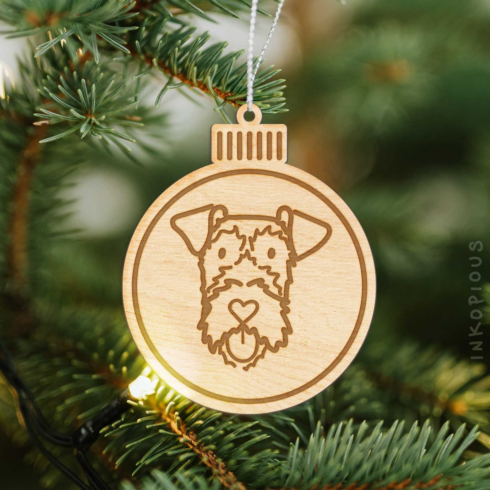 Minimalist line drawing of an Irish Terrier with a red heart on an Ornament wooden ornament