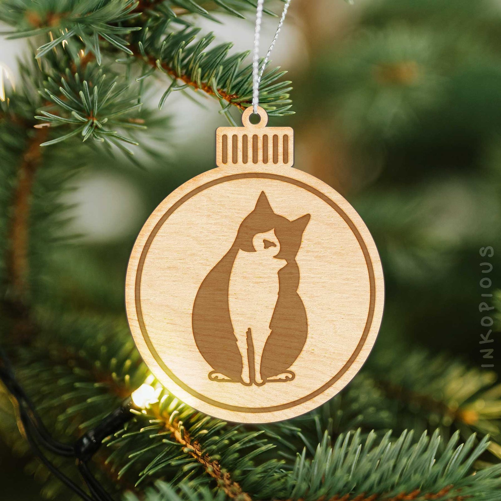 Minimalist line drawing of Oliver the Tuxedo Cat with a red heart on an Ornament wooden ornament