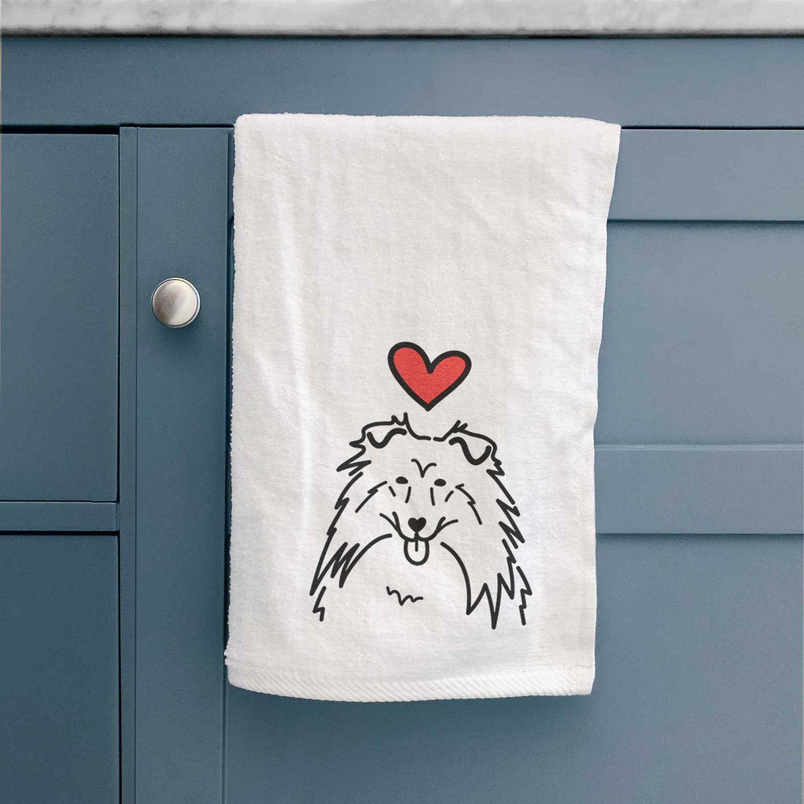 Minimalist line drawing of a Rough Collie with a red heart on a decorative hand towel