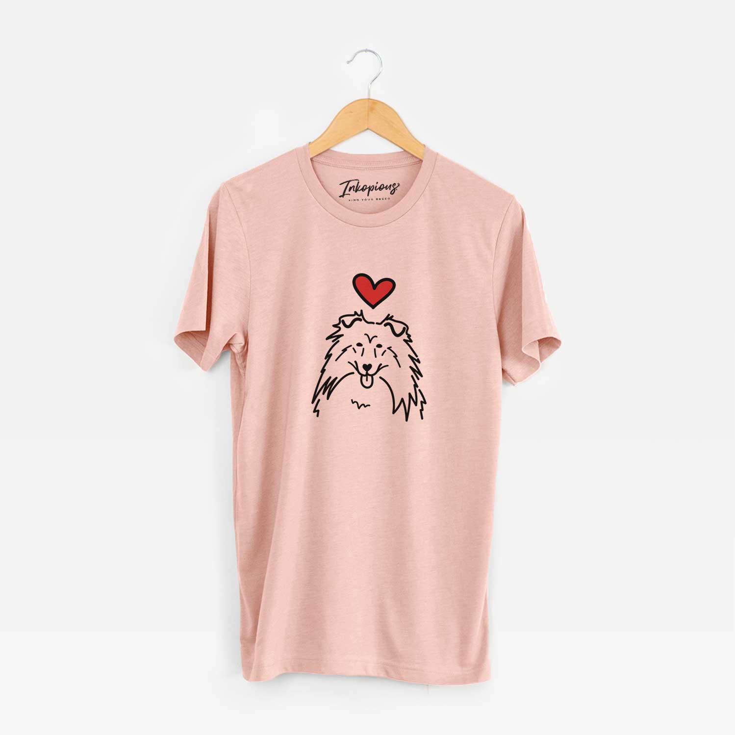Minimalist line drawing of a Rough Collie with a red heart on a Peach Unisex crewneck
