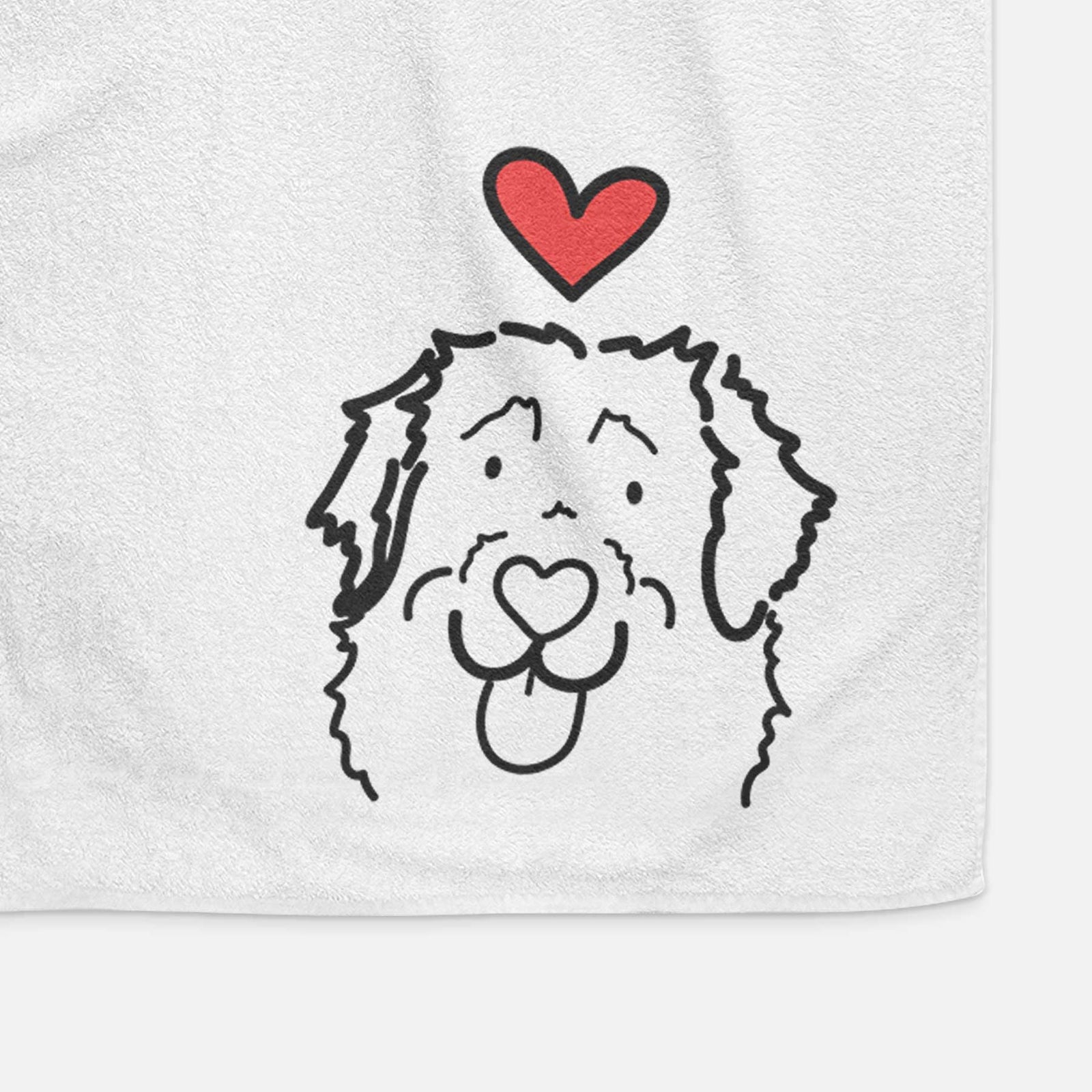 Minimalist line drawing of Sabre the Leonberger with a red heart on a decorative hand towel