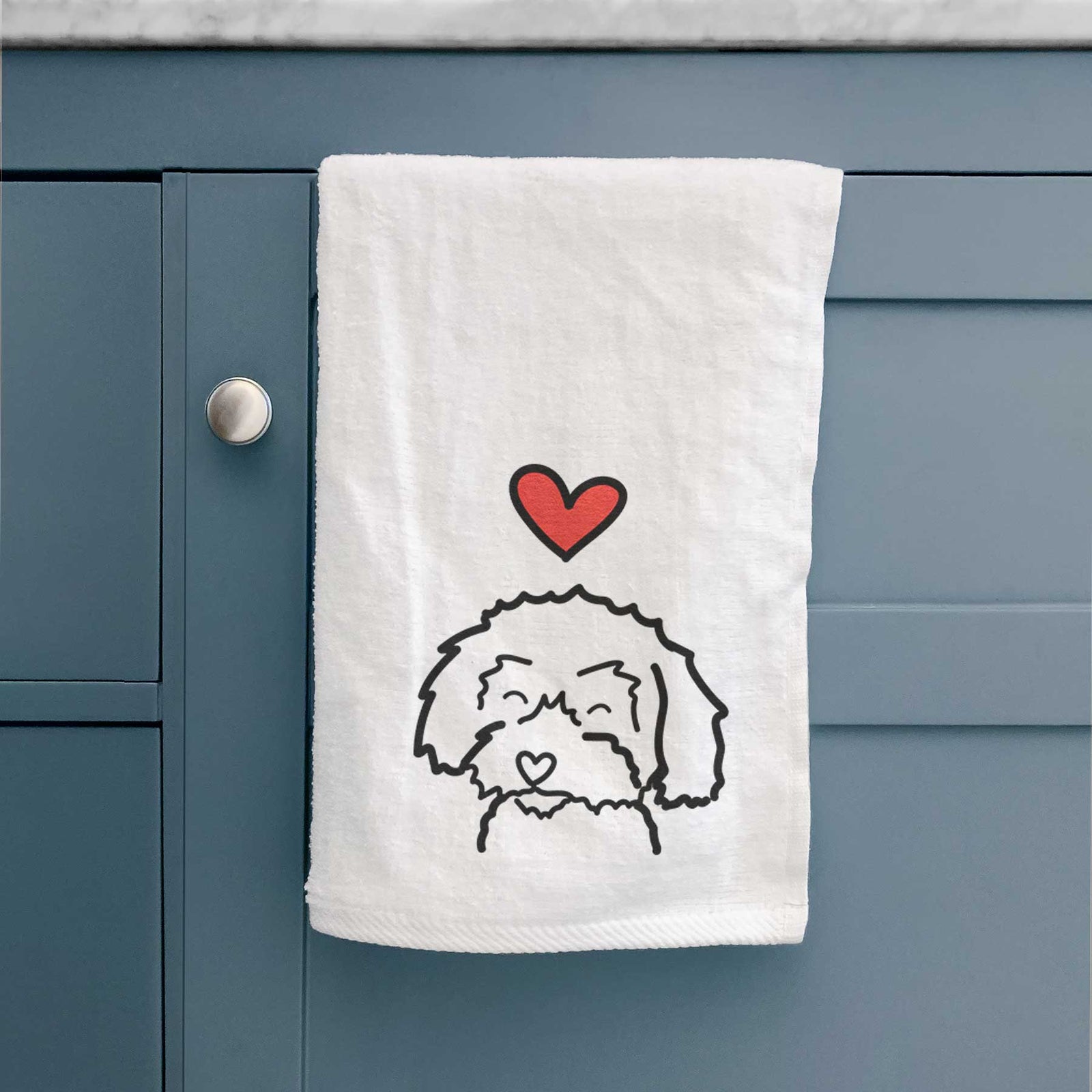 Minimalist line drawing of a Schnoodle with a red heart on a decorative hand towel