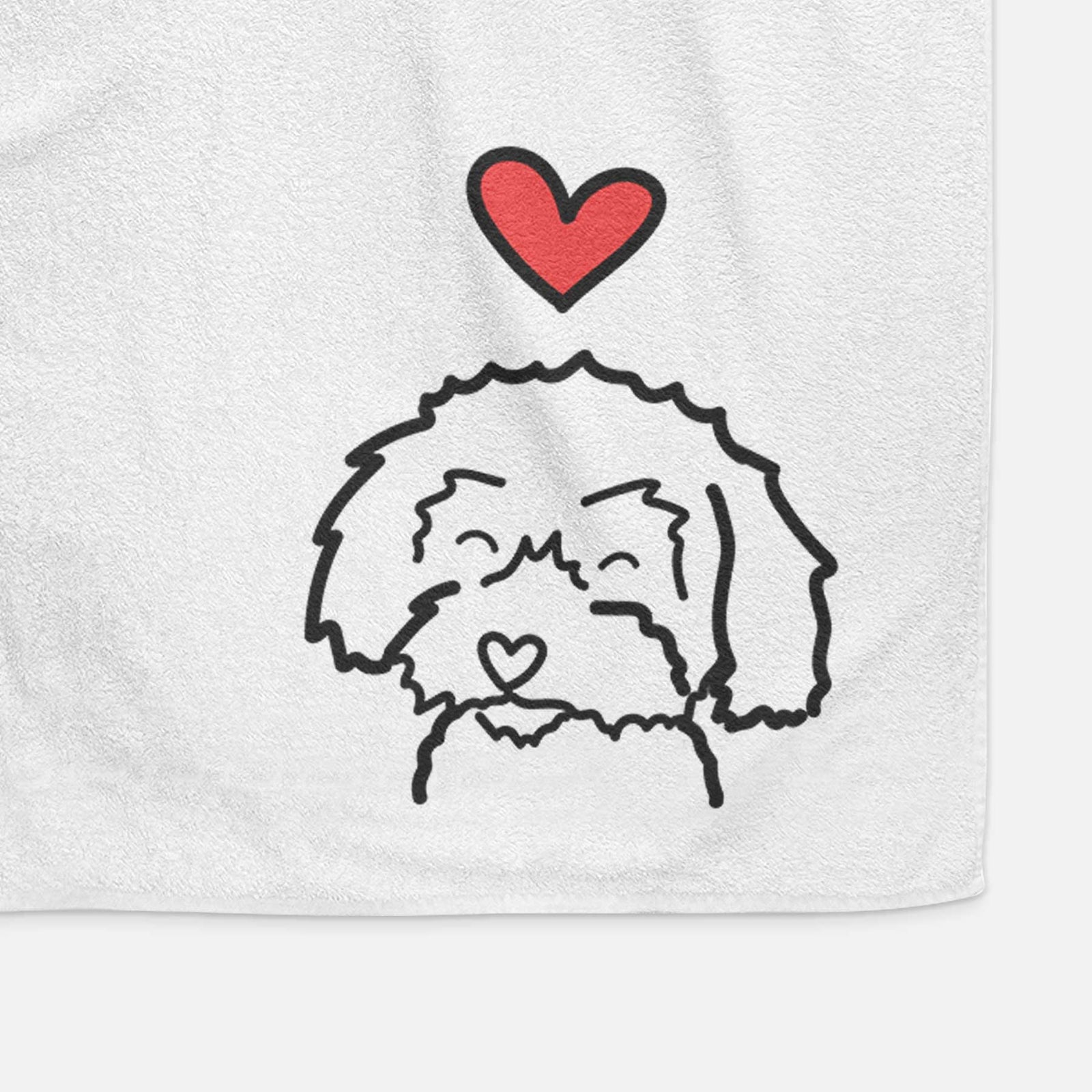Minimalist line drawing of a Schnoodle with a red heart on a decorative hand towel