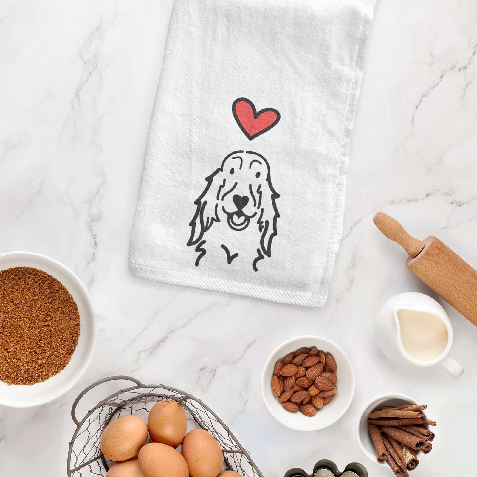 Minimalist line drawing of a Setter with a red heart on a decorative hand towel