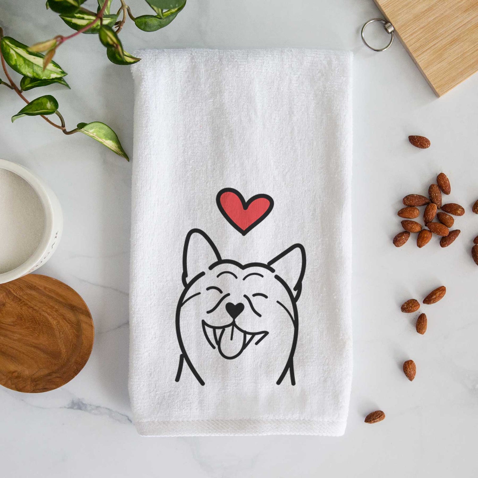 Minimalist line drawing of a Shiba Inu with a red heart on a decorative hand towel