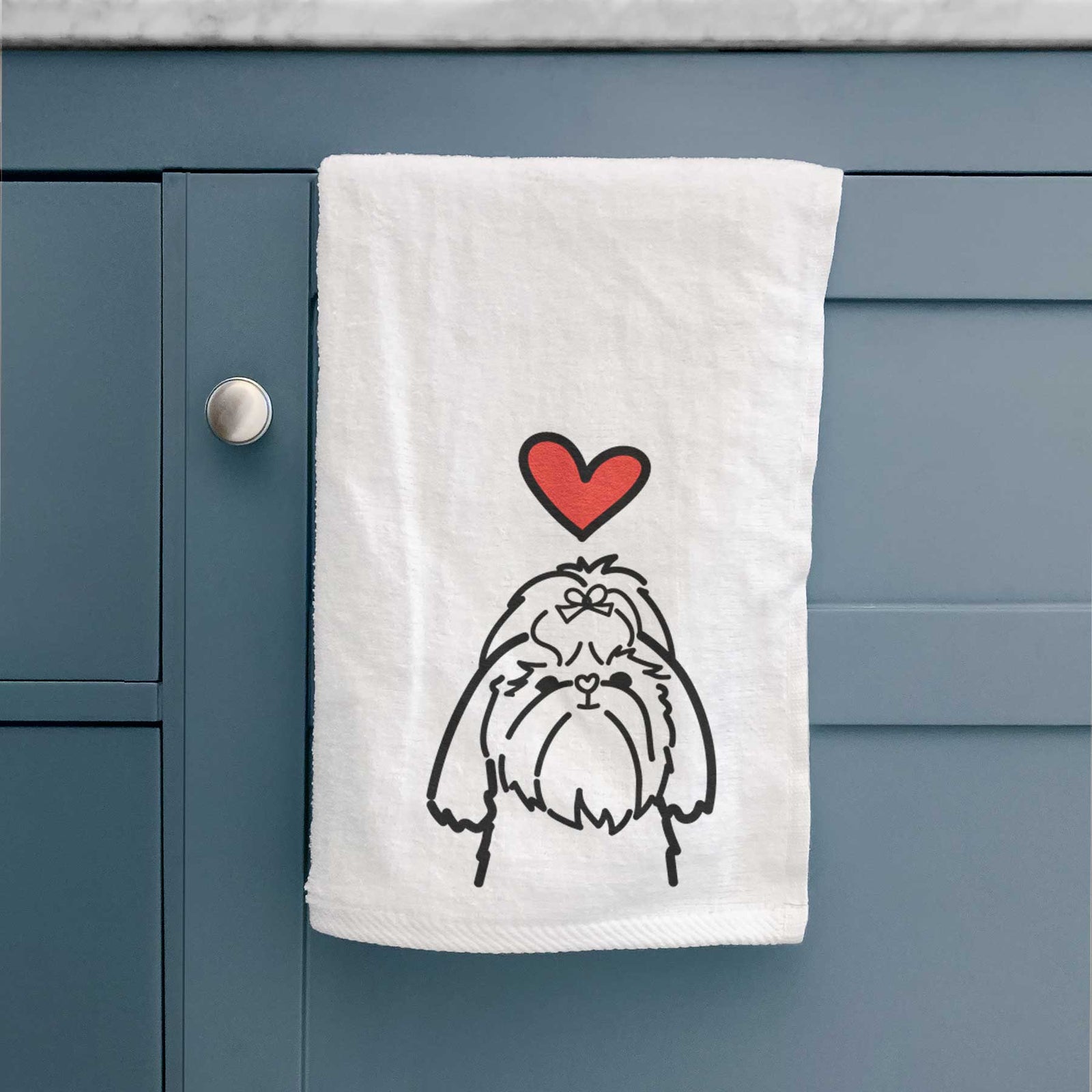 Minimalist line drawing of a Shih Tzu with a red heart on a decorative hand towel