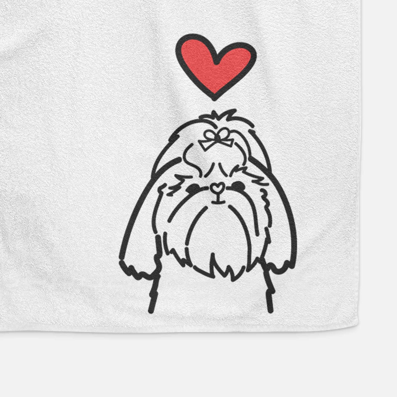Minimalist line drawing of a Shih Tzu with a red heart on a decorative hand towel