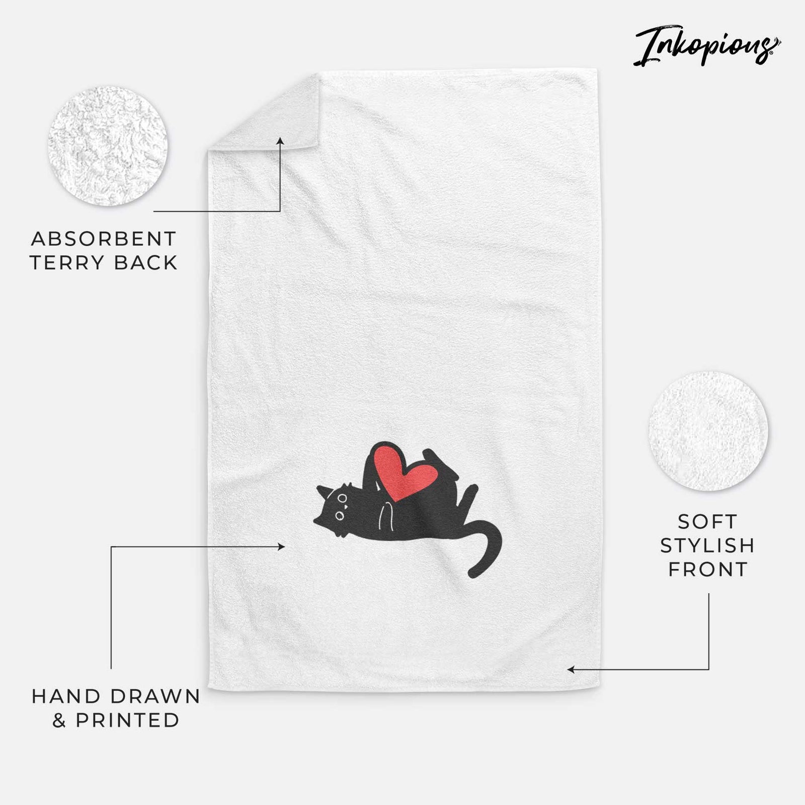Minimalist line drawing of Smash the Black Cat with a red heart on a decorative hand towel