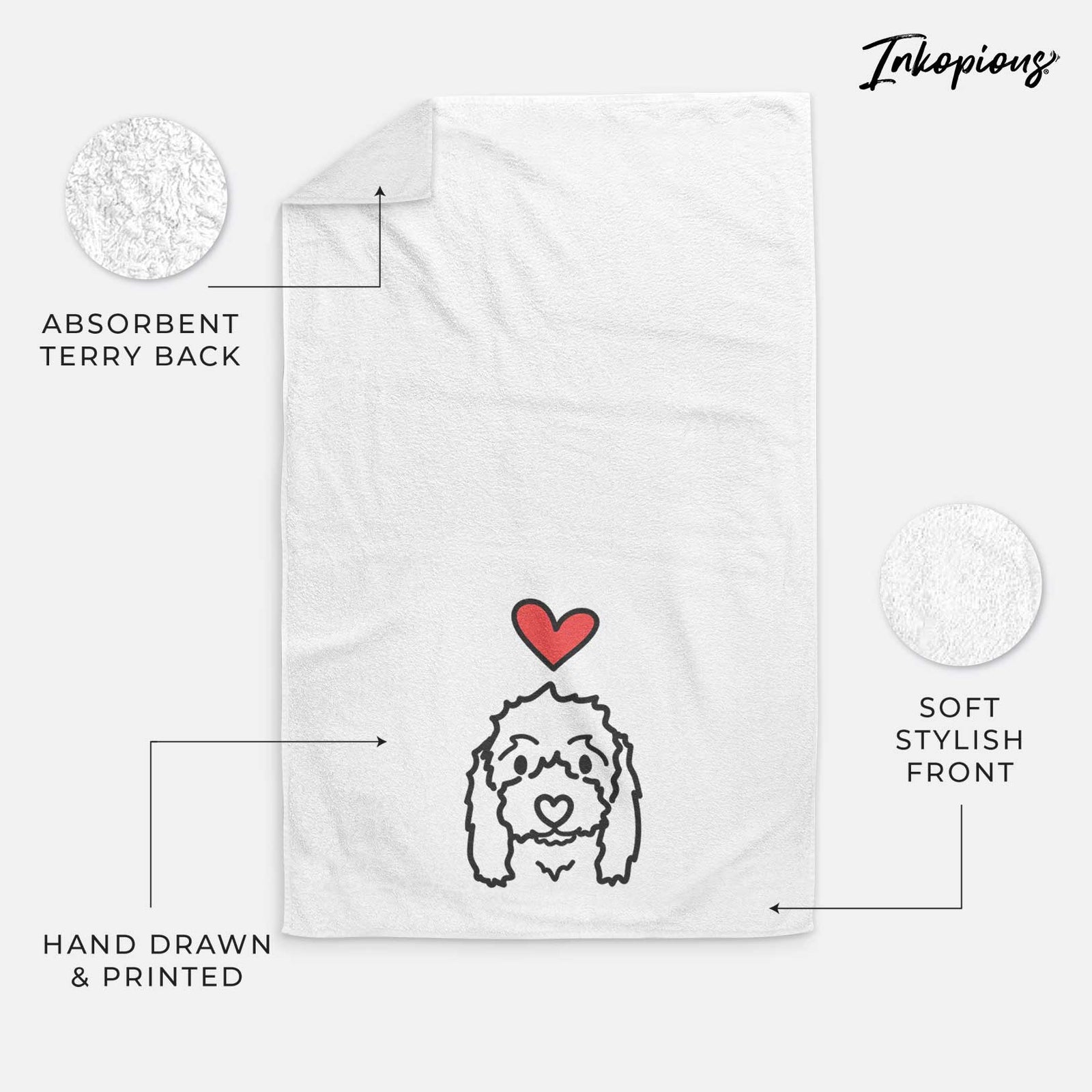 Minimalist line drawing of Sophie the Coton de Tulear with a red heart on a decorative hand towel