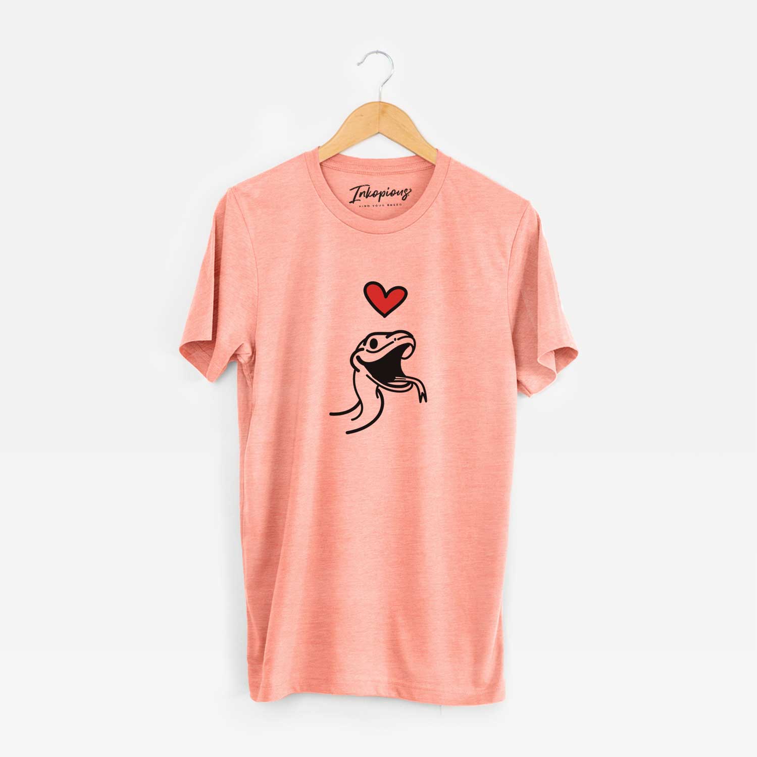 Minimalist line drawing of Spike the Snake with a red heart on a Sunset Unisex crewneck