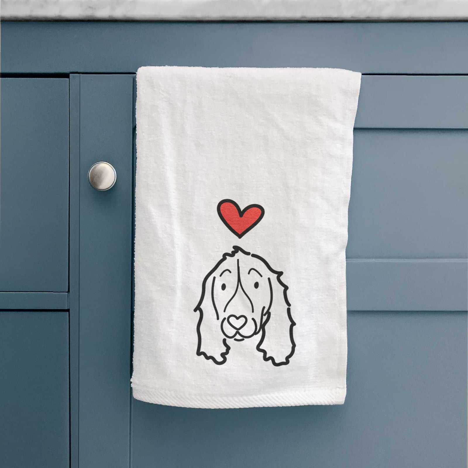 Minimalist line drawing of an English Springer Spaniel with a red heart on a decorative hand towel