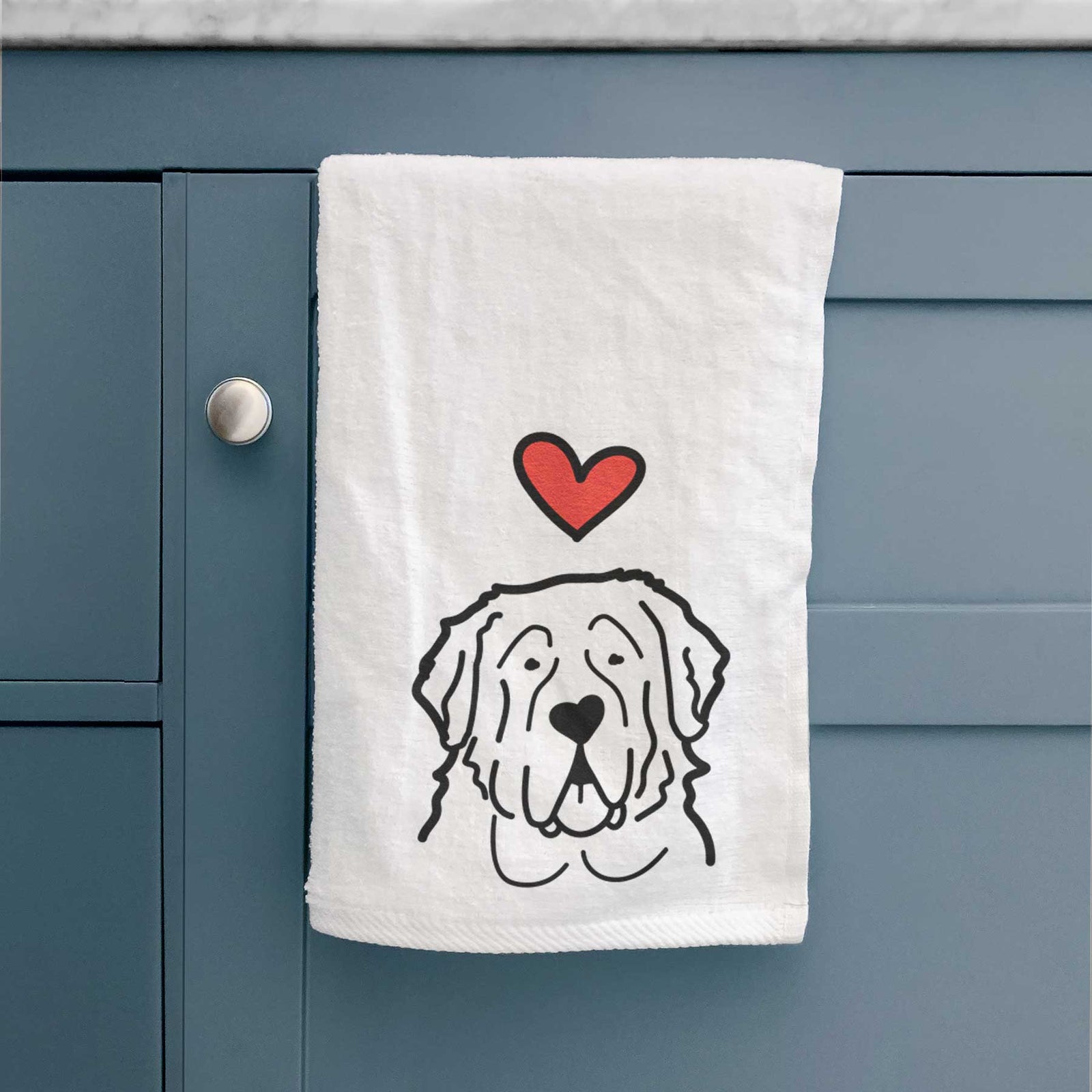 Minimalist line drawing of a Saint Bernard with a red heart on a decorative hand towel