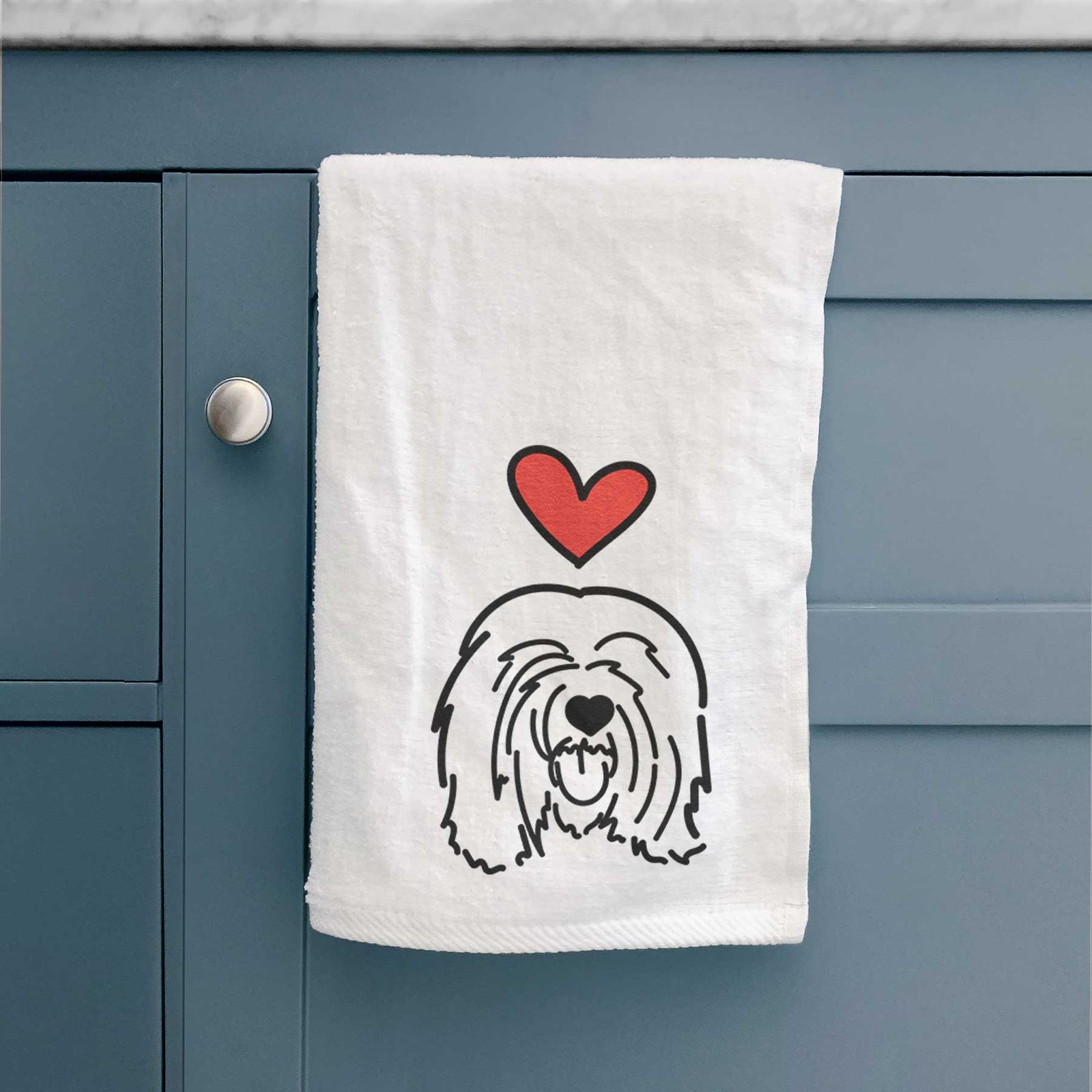 Minimalist line drawing of Stan the Tibetan Mastiff with a red heart on a decorative hand towel