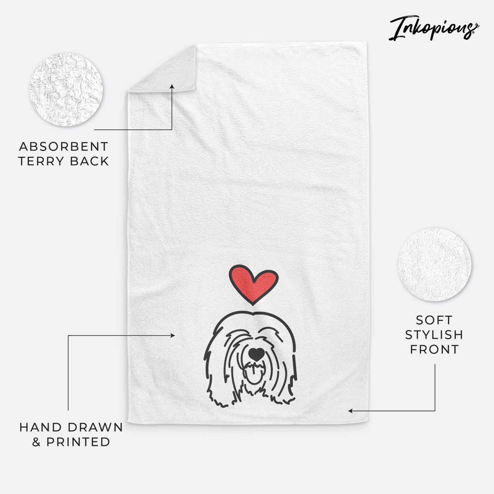 Minimalist line drawing of Stan the Tibetan Mastiff with a red heart on a decorative hand towel