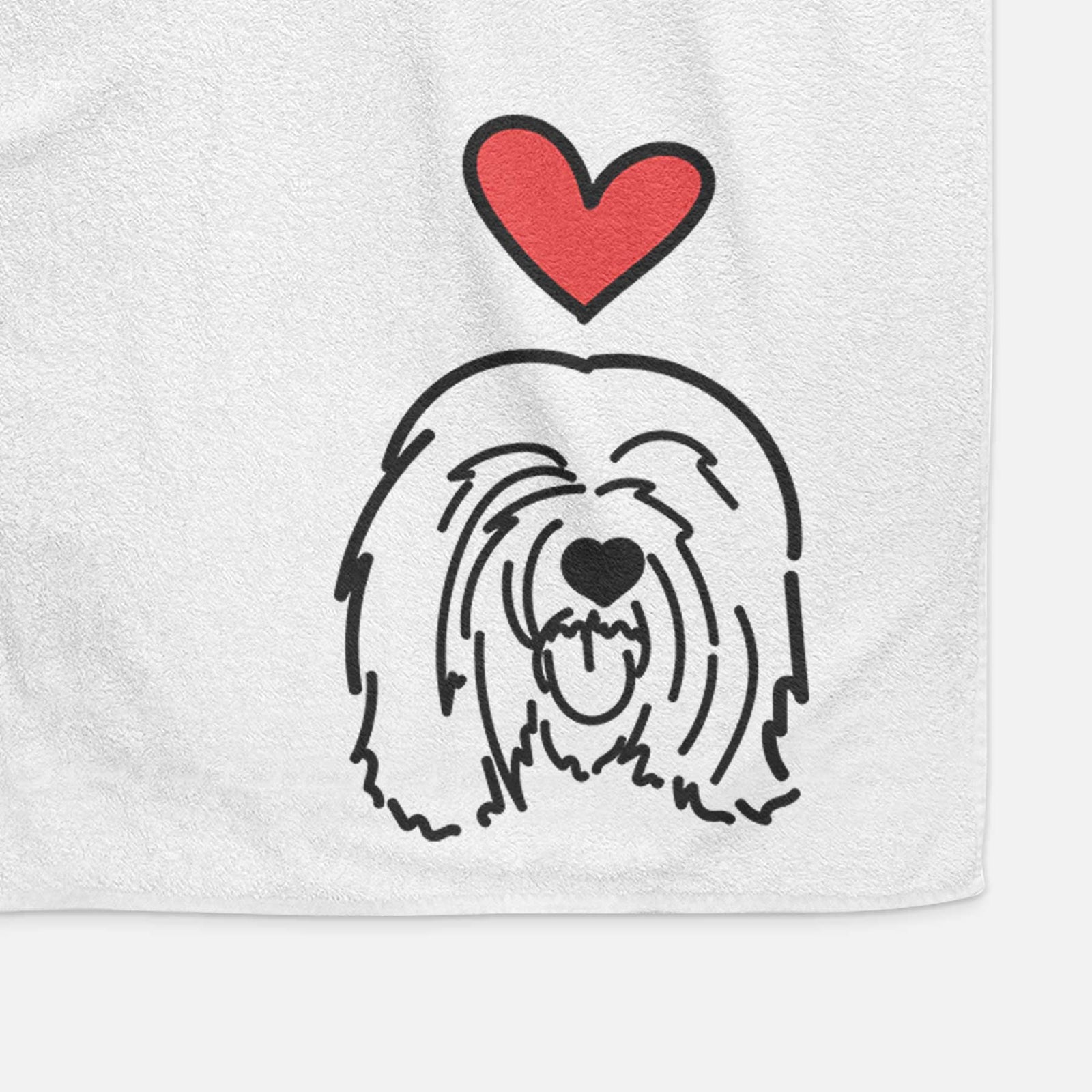 Minimalist line drawing of Stan the Tibetan Mastiff with a red heart on a decorative hand towel