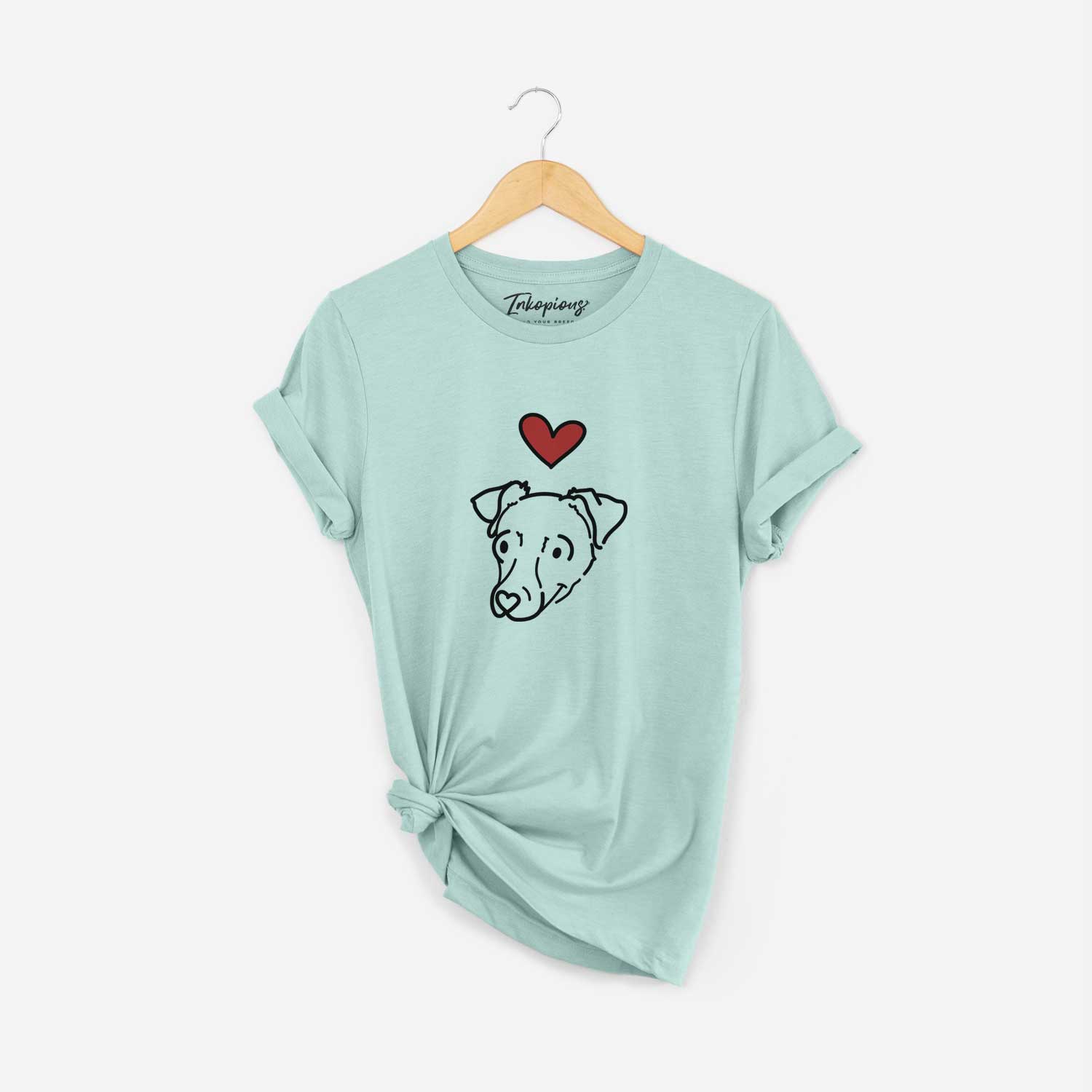 Minimalist line drawing of Tater Tot the Chiweenie with a red heart on a Heather Sage Unisex crewneck