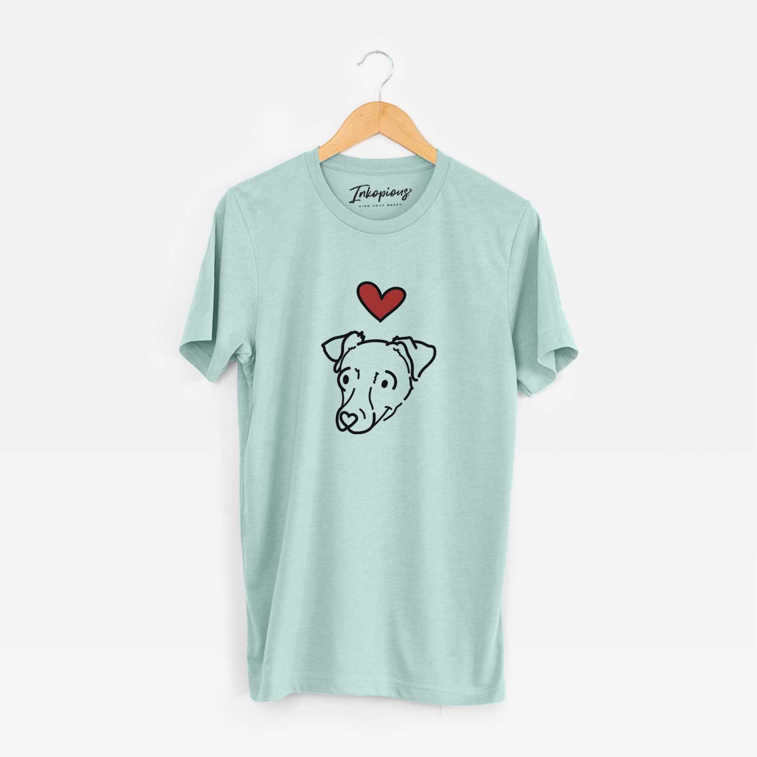 Minimalist line drawing of Tater Tot the Chiweenie with a red heart on a Heather Sage Unisex crewneck