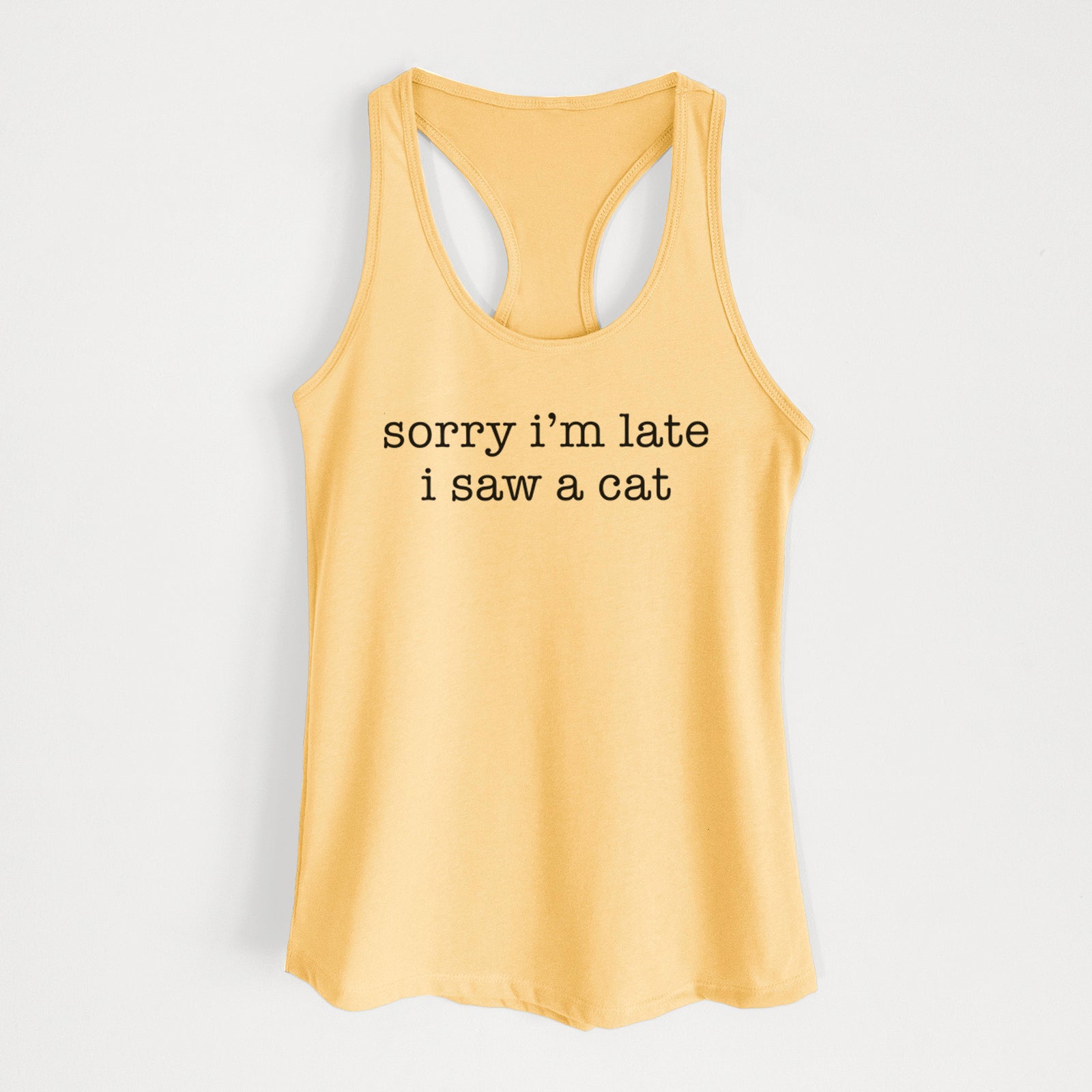 'Sorry I'm Late I Saw a Cat' design on a Banana Cream Women's racerback tanktop