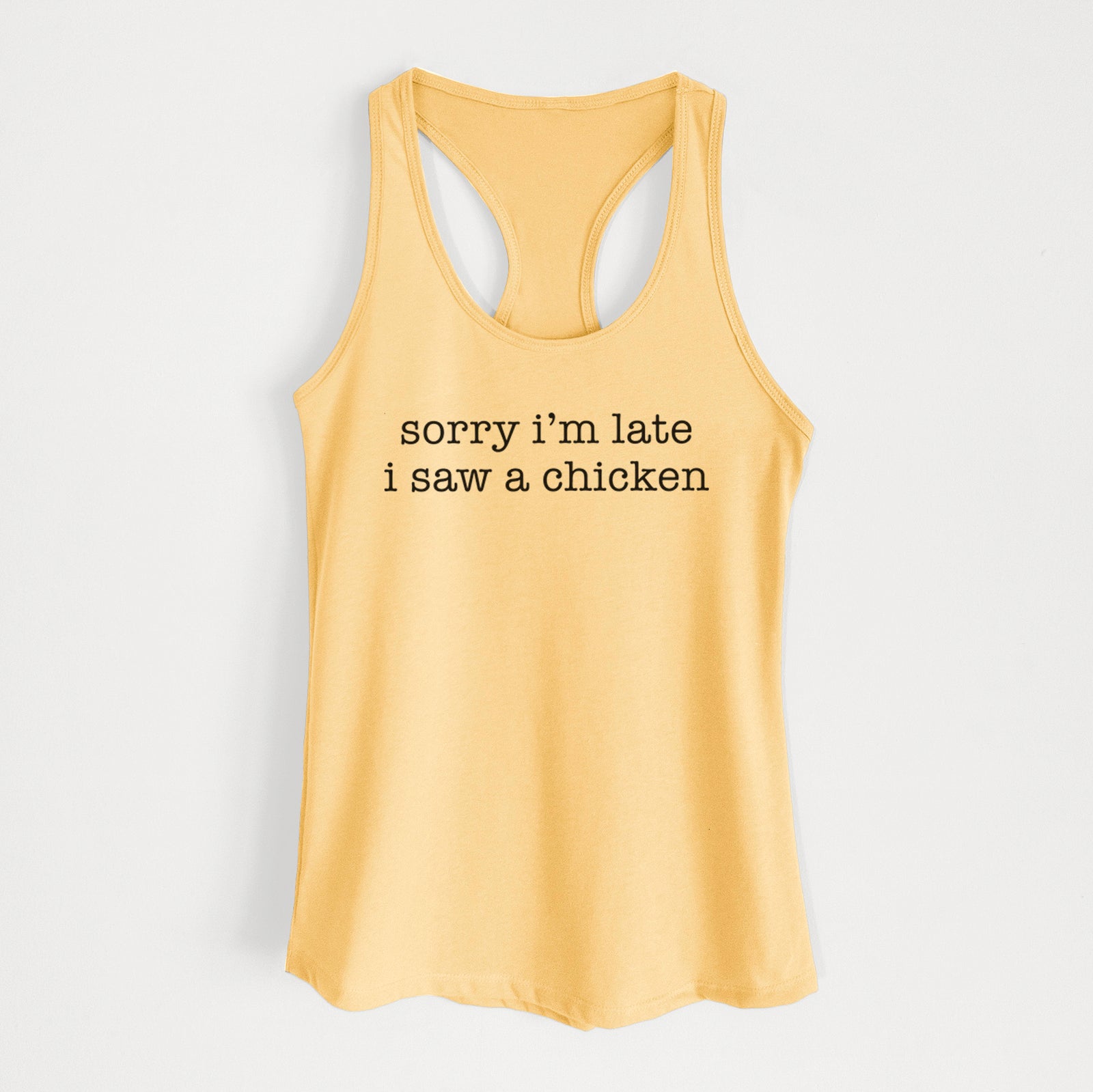 'Sorry I'm Late I Saw a Chicken' design on a Banana Cream Women's racerback tanktop