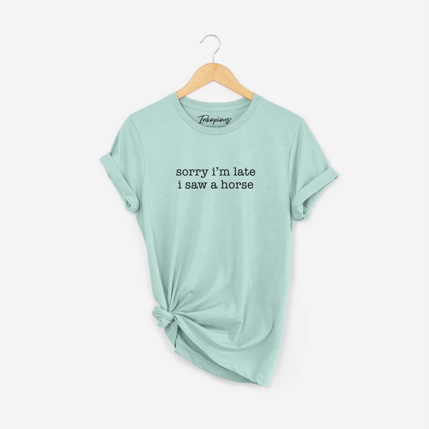 'Sorry I'm Late I Saw a Horse' design on a Heather Sage Unisex crewneck