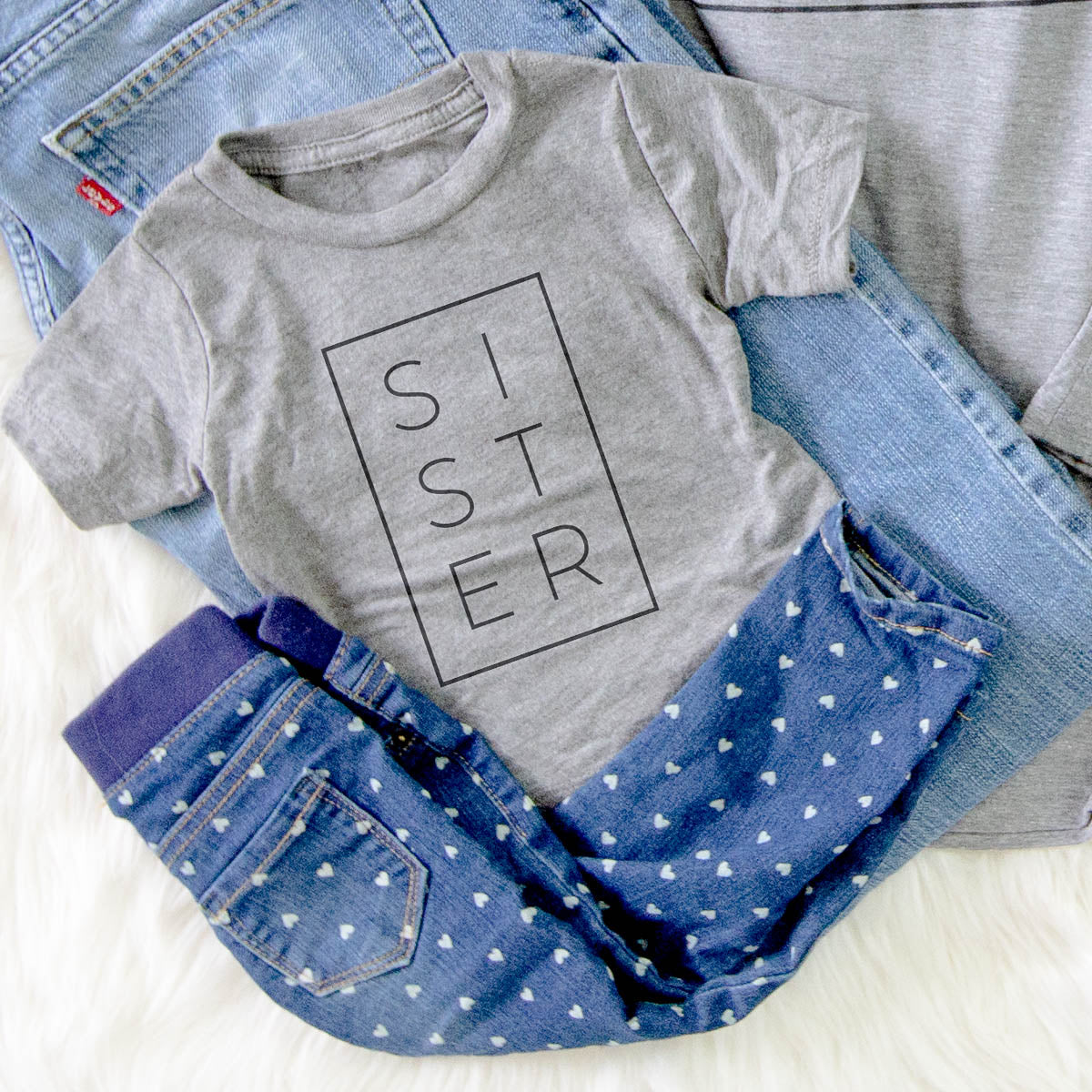 'Sister Boxed' design on an Edit kids' shirt