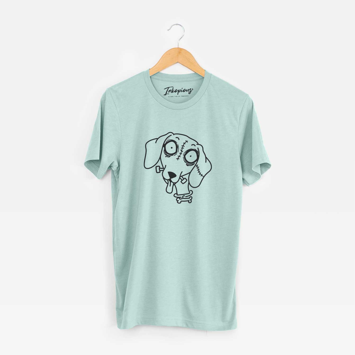Minimalist line drawing of Dachshund - Nightmare Collection on a Heather Sage Unisex crewneck