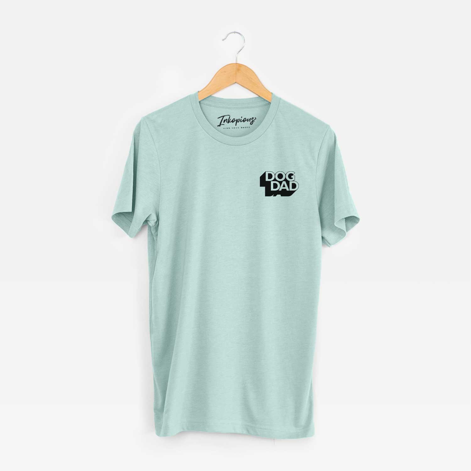 Small chest-pocket hand-drawn sketch of Dog Dad - Blockscape Collection on a Heather Sage Unisex crewneck