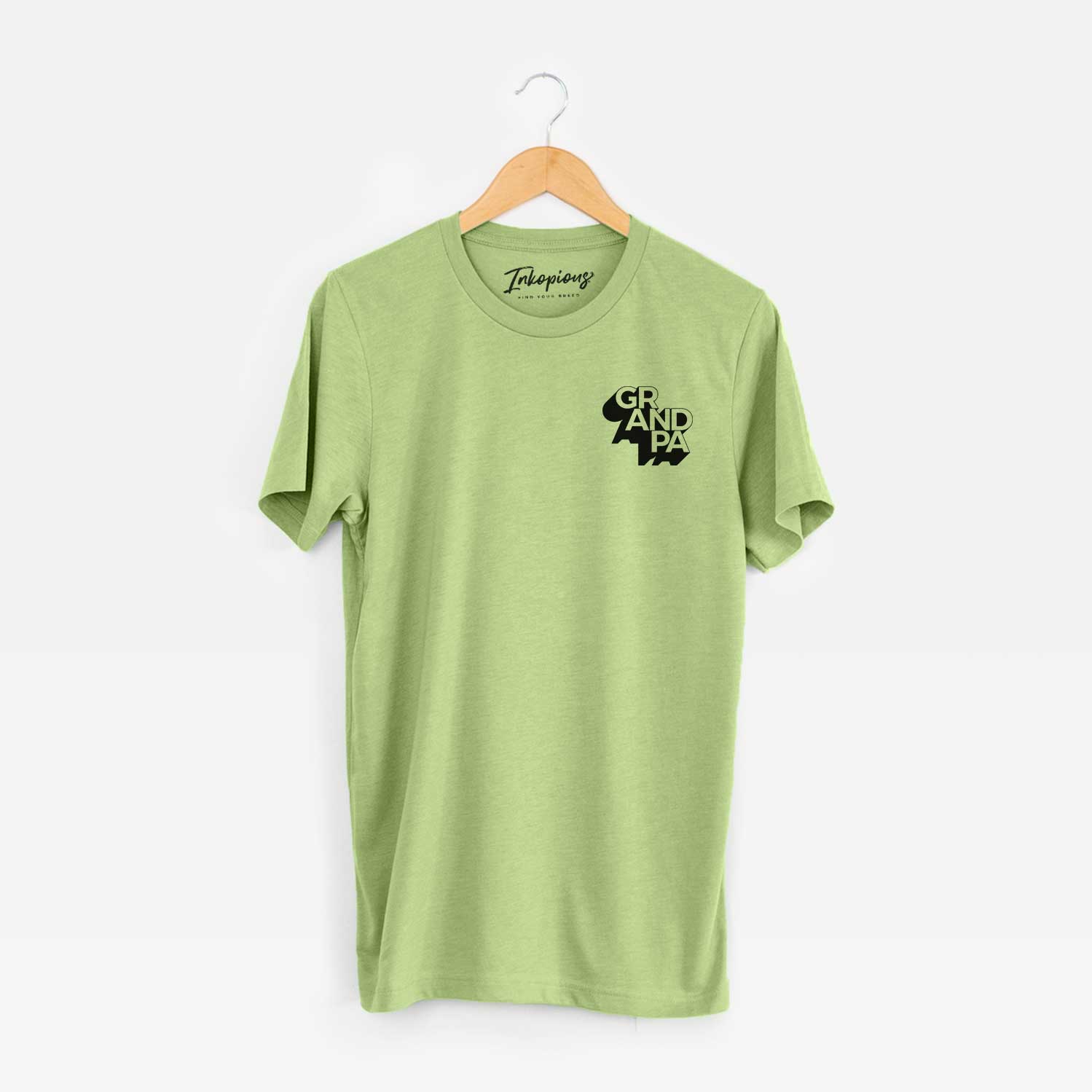 Small chest-pocket hand-drawn sketch of Grandpa - Blockscape Collection on a Heather Green Unisex crewneck