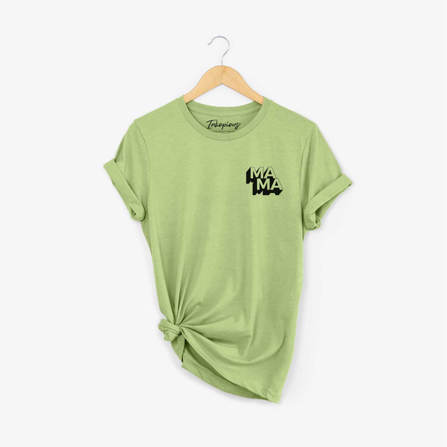 Small chest-pocket hand-drawn sketch of Mama - Blockscape Collection on a Heather Green Unisex crewneck