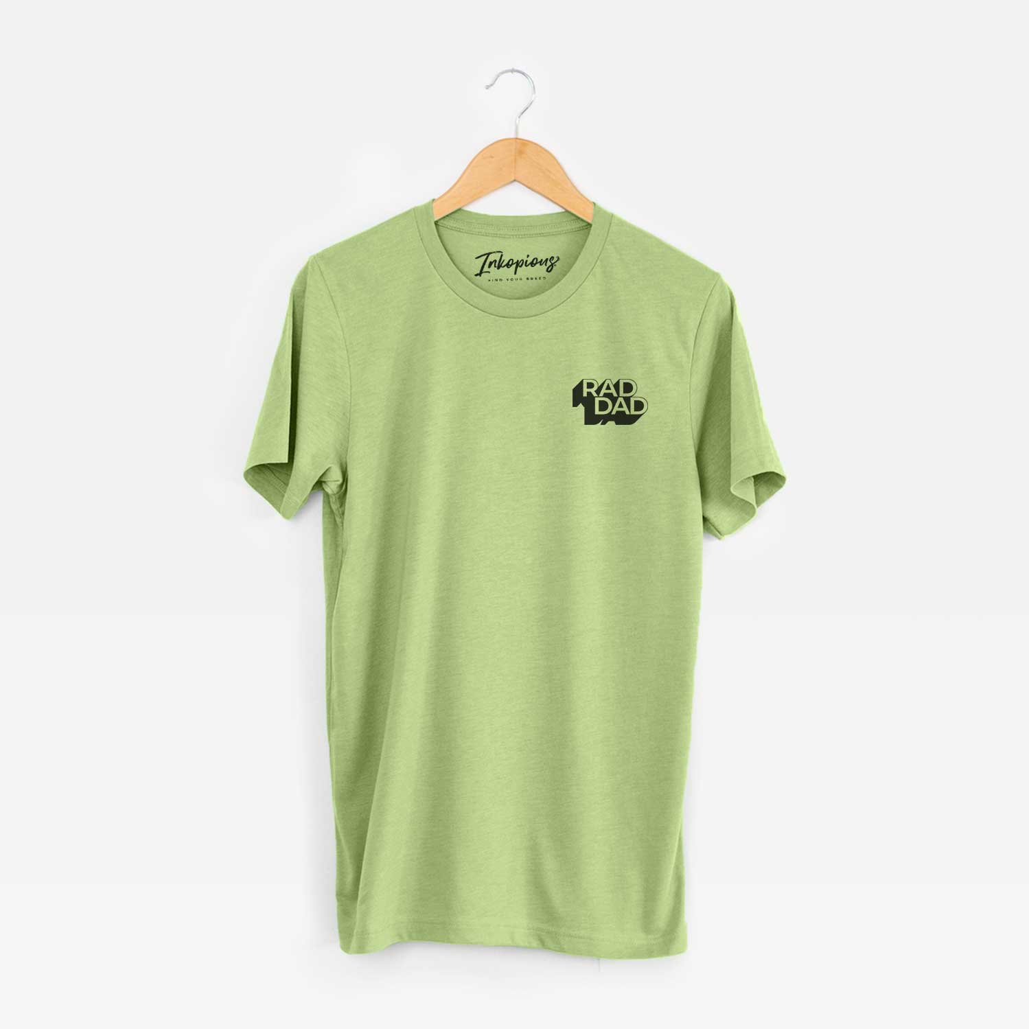 Small chest-pocket hand-drawn sketch of Rad Dad - Blockscape Collection on a Heather Green Unisex crewneck