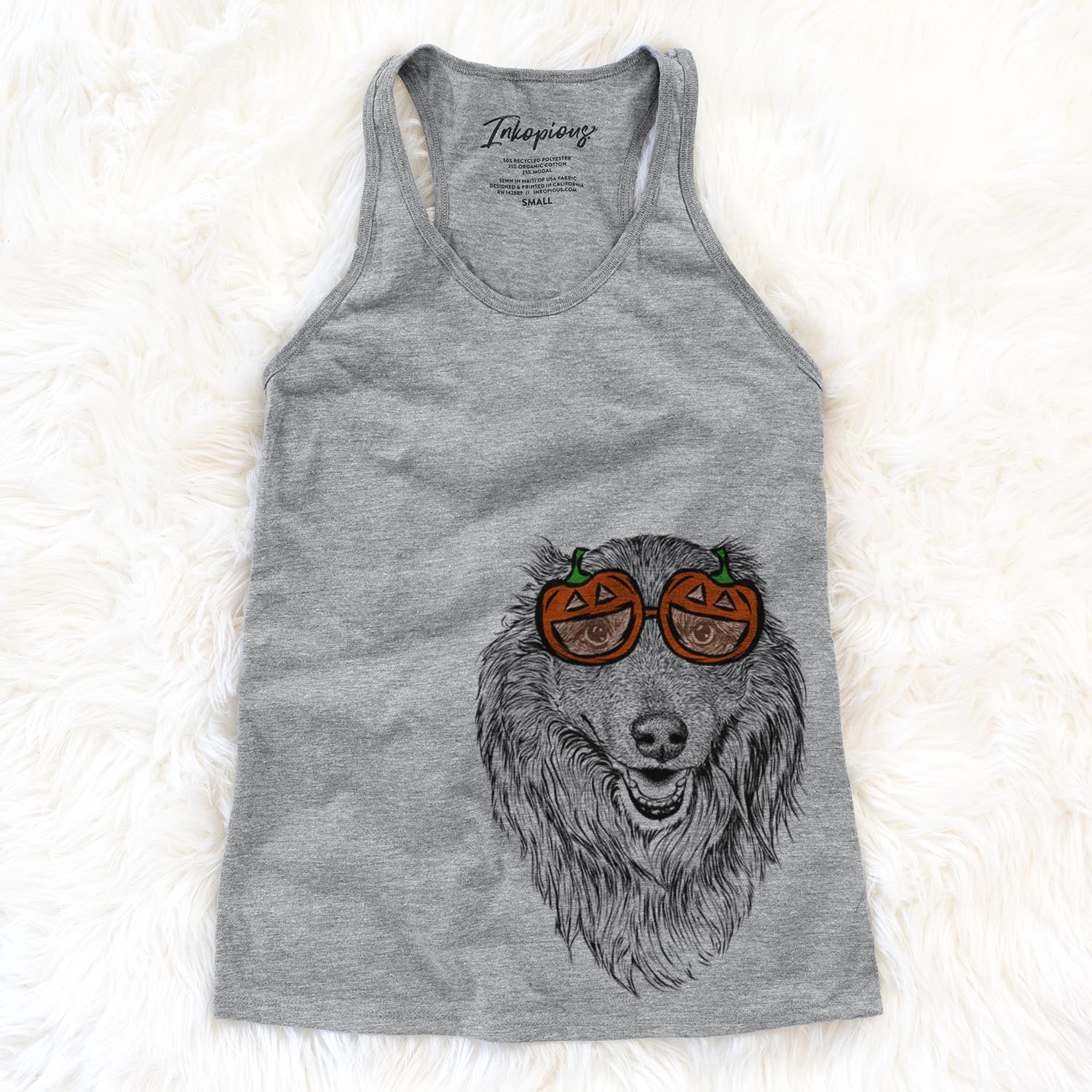 Hand-drawn sketch of Addie the Mixed Breed wearing pumpkin glasses on a Grey pumpkin collection